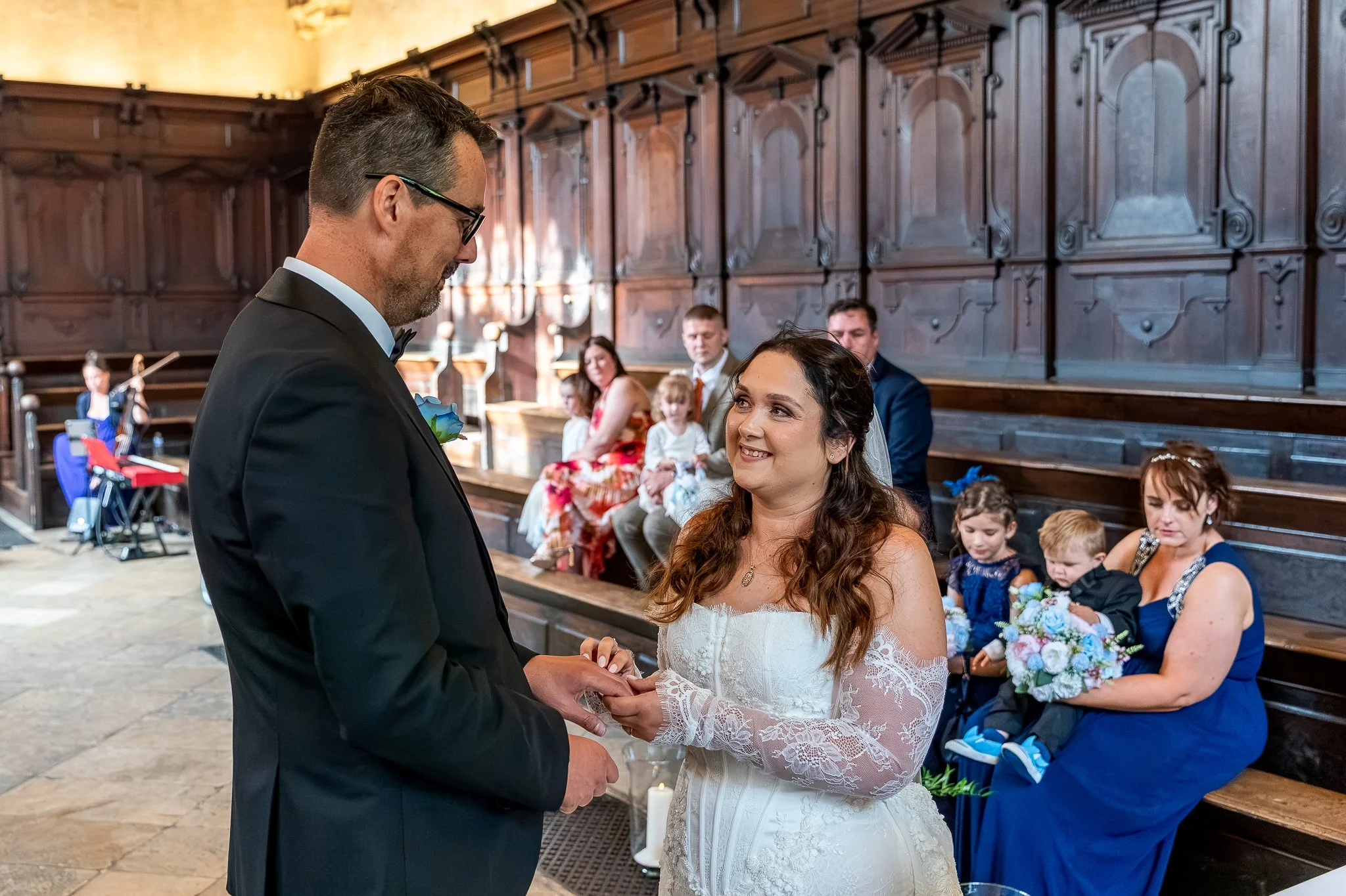 263-joe-stacey-bride-places-ring-convocation-house.jpg