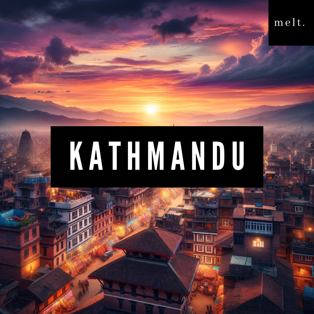 Kathmandu candle by melt., surrounded by elements representing its exotic and serene essence