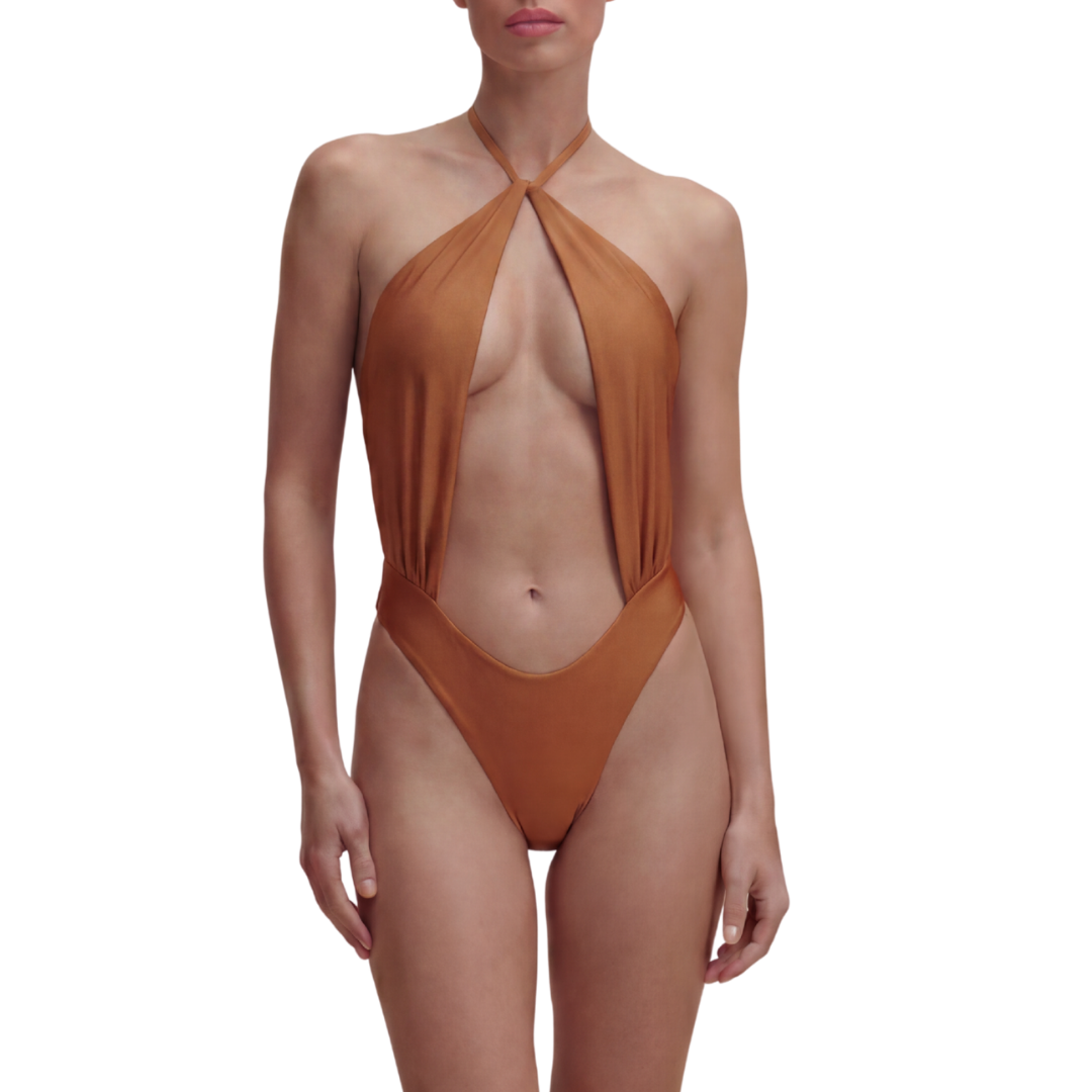 Two-in-one reversible trikini  Macadamia Cream and Burnt Sand. Signature cross-neck detail, adjustable tie back, front minimal bust coverage.