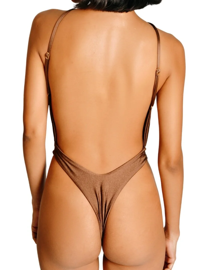 Can be worn as a one piece swimsuit or as a cut out bodysuit for a girls night out in town.