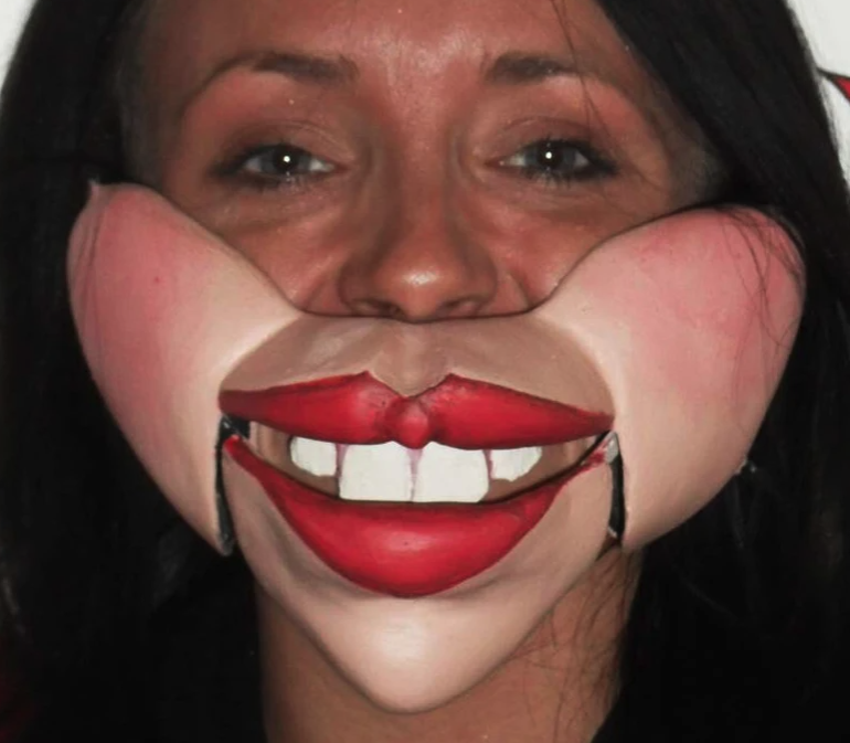 Female Professional ventriloquist cable controlled mask