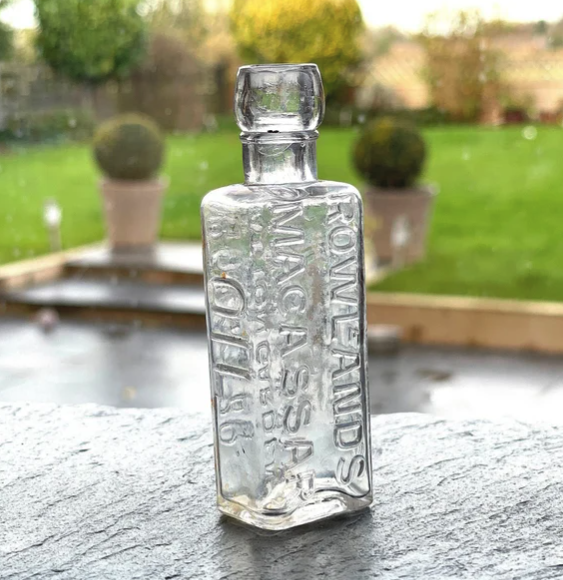 Vintage Alice and Wonderland Potion Bottle