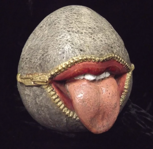 Zippered Tongue Rock Statue