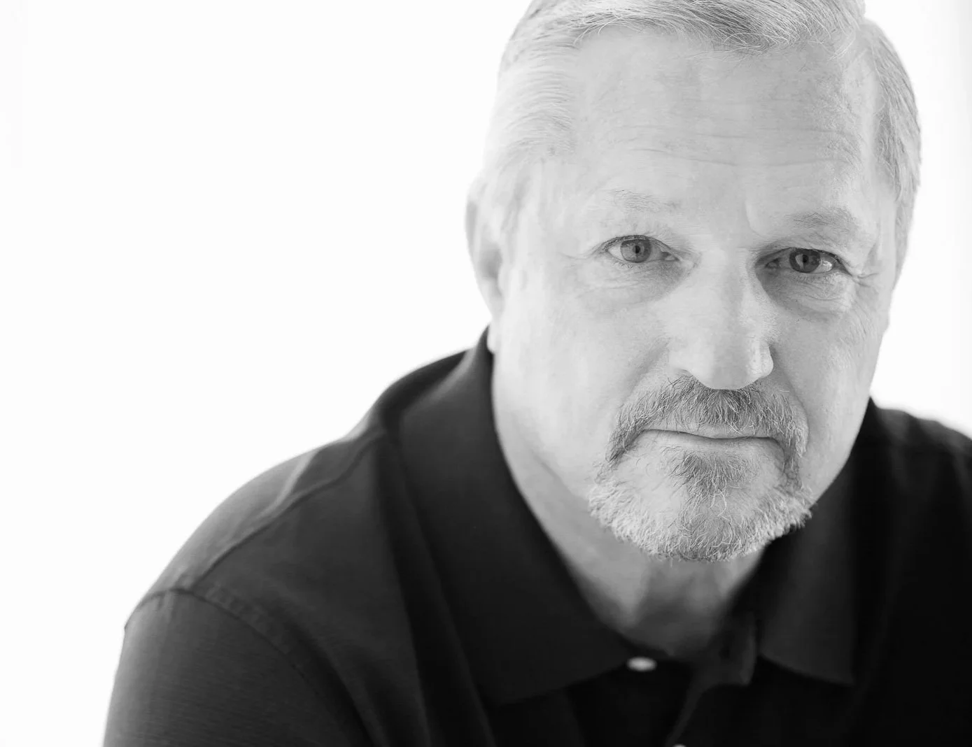 Close-up portrait of male business owner in black and white