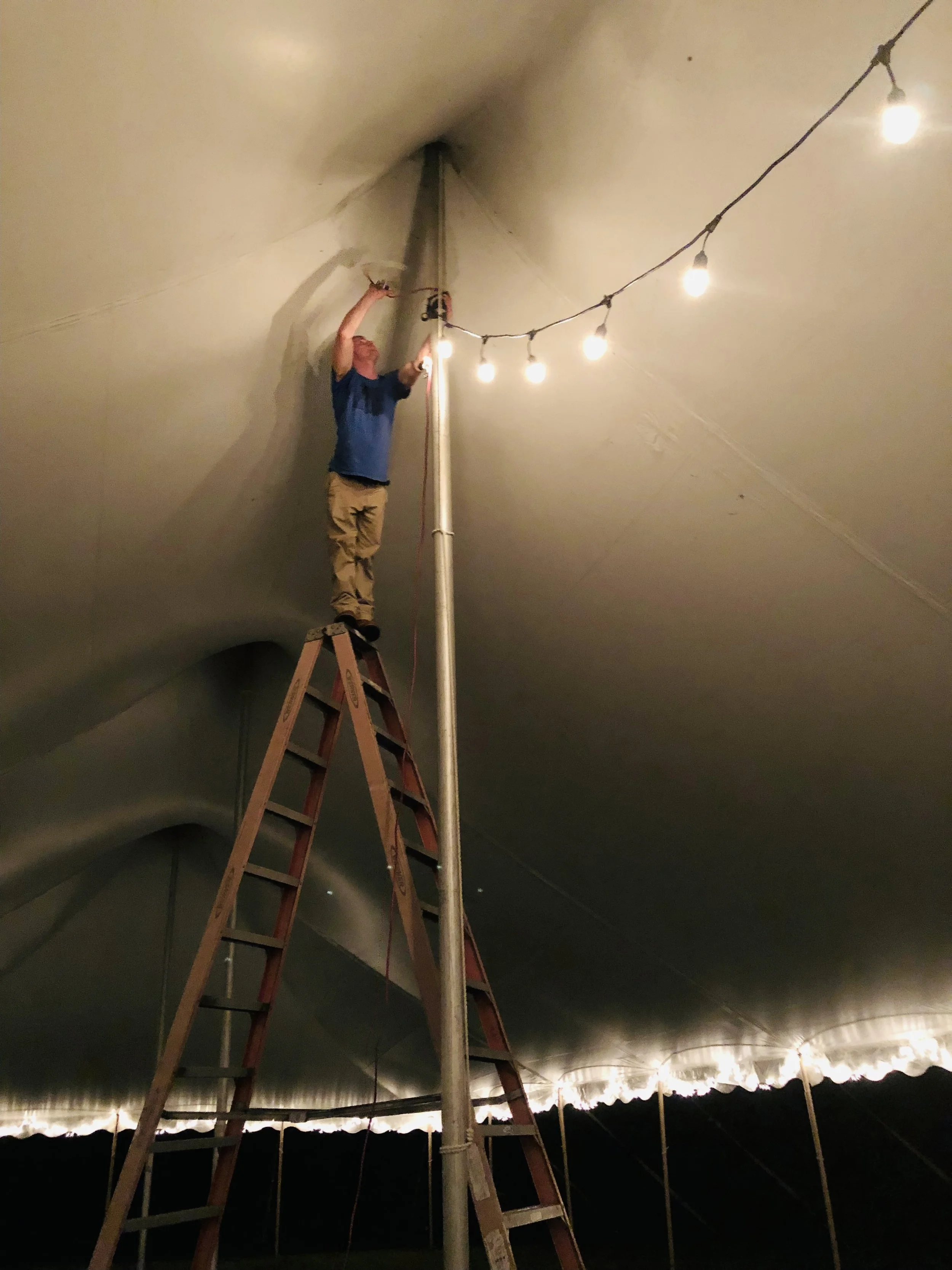 justin ladder stringlights.jpg