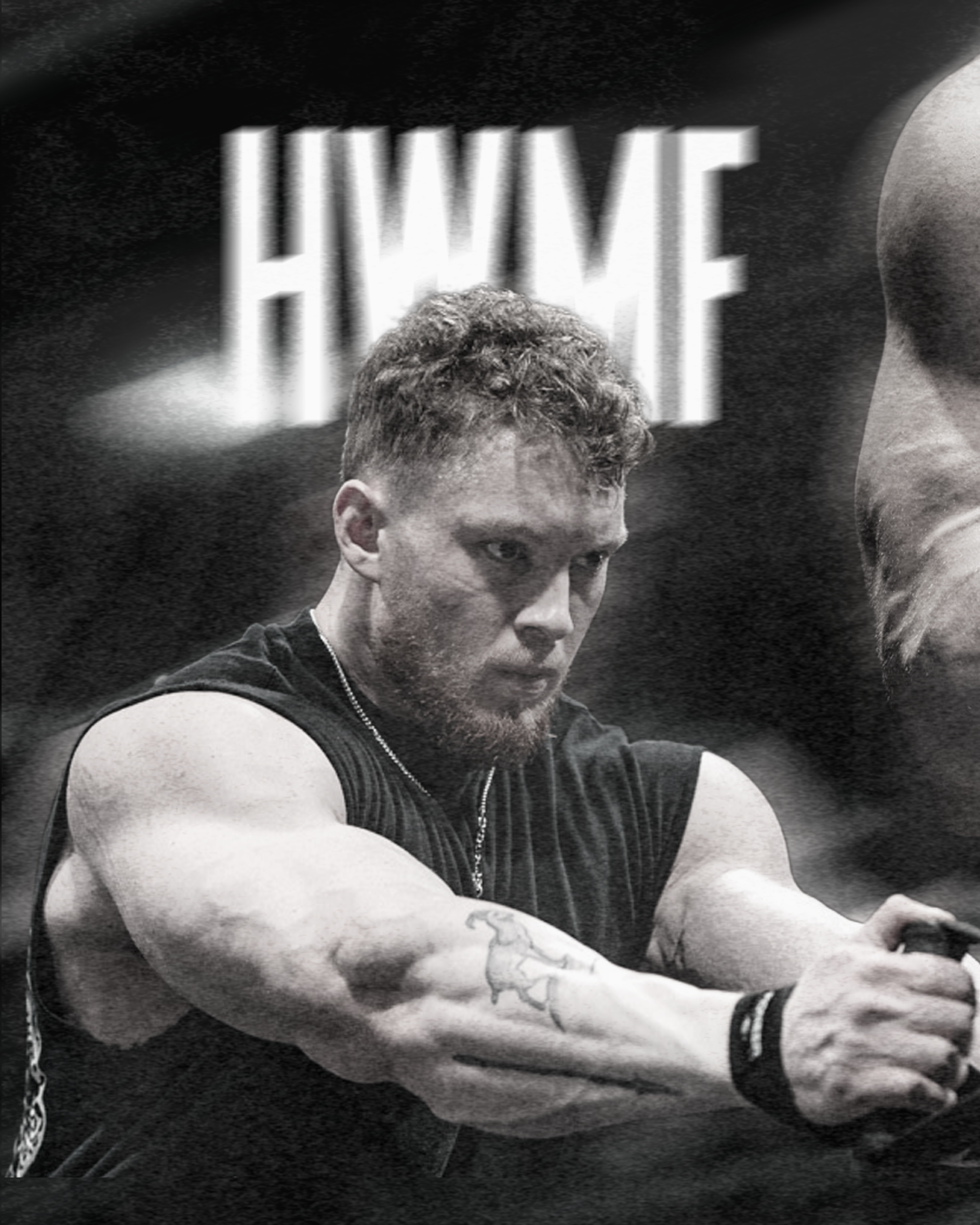 Black and white photograph of a young man with short, curly hair, wearing a sleeveless athletic shirt, sitting with his arms crossed and looking downward.