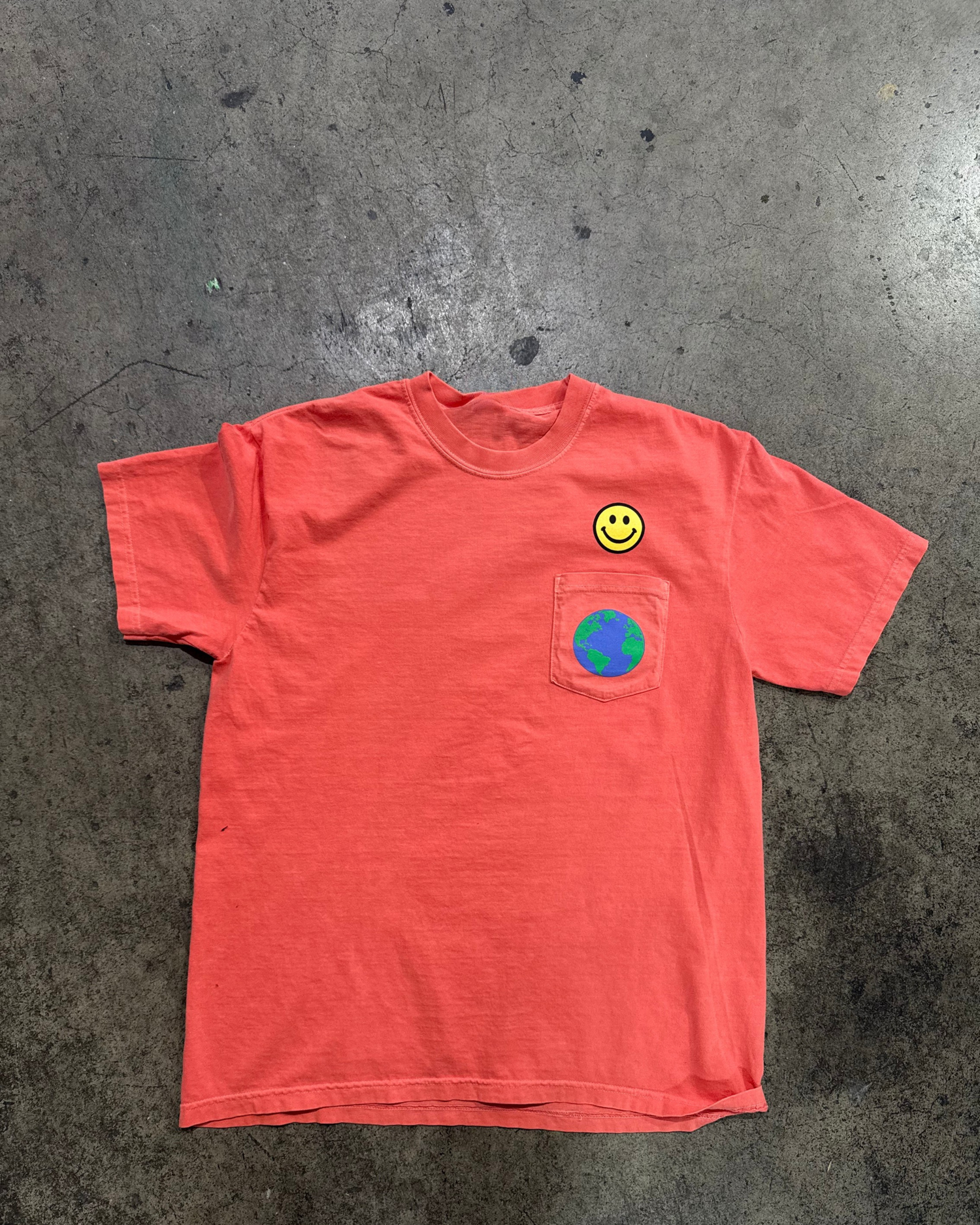 The World Will Adjust Orange Pocket Tee — PEACE LOVE AUTISM