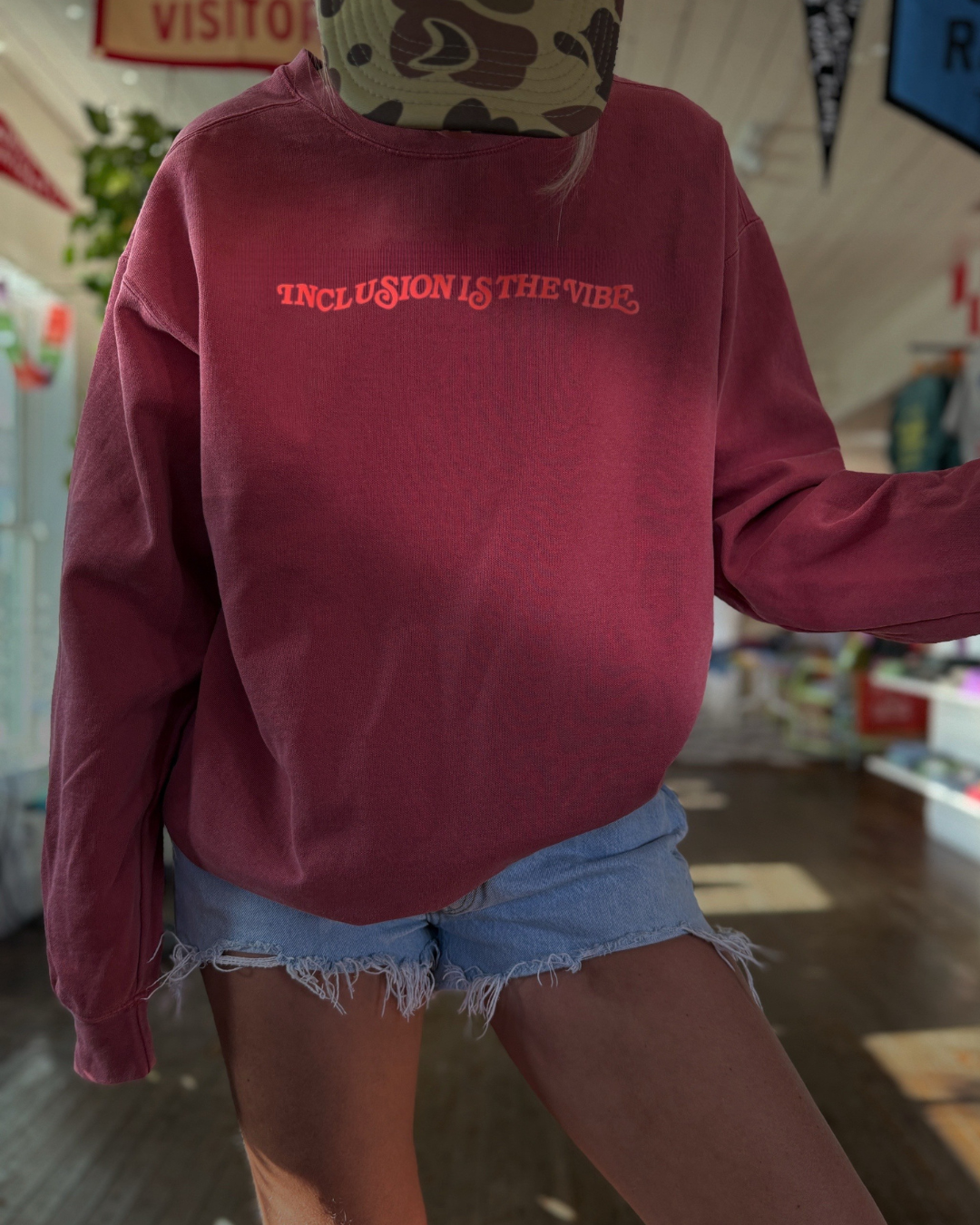 INCLUSION IS THE VIBE melon + maroon sweatshirt