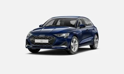 Blue Audi A3 hatchback car in a studio setting.
