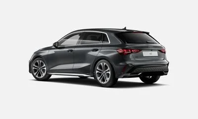 A sleek black station wagon car shown from a rear three-quarter angle.
