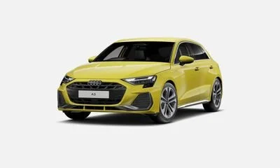 Yellow Audi A3 hatchback car facing forward