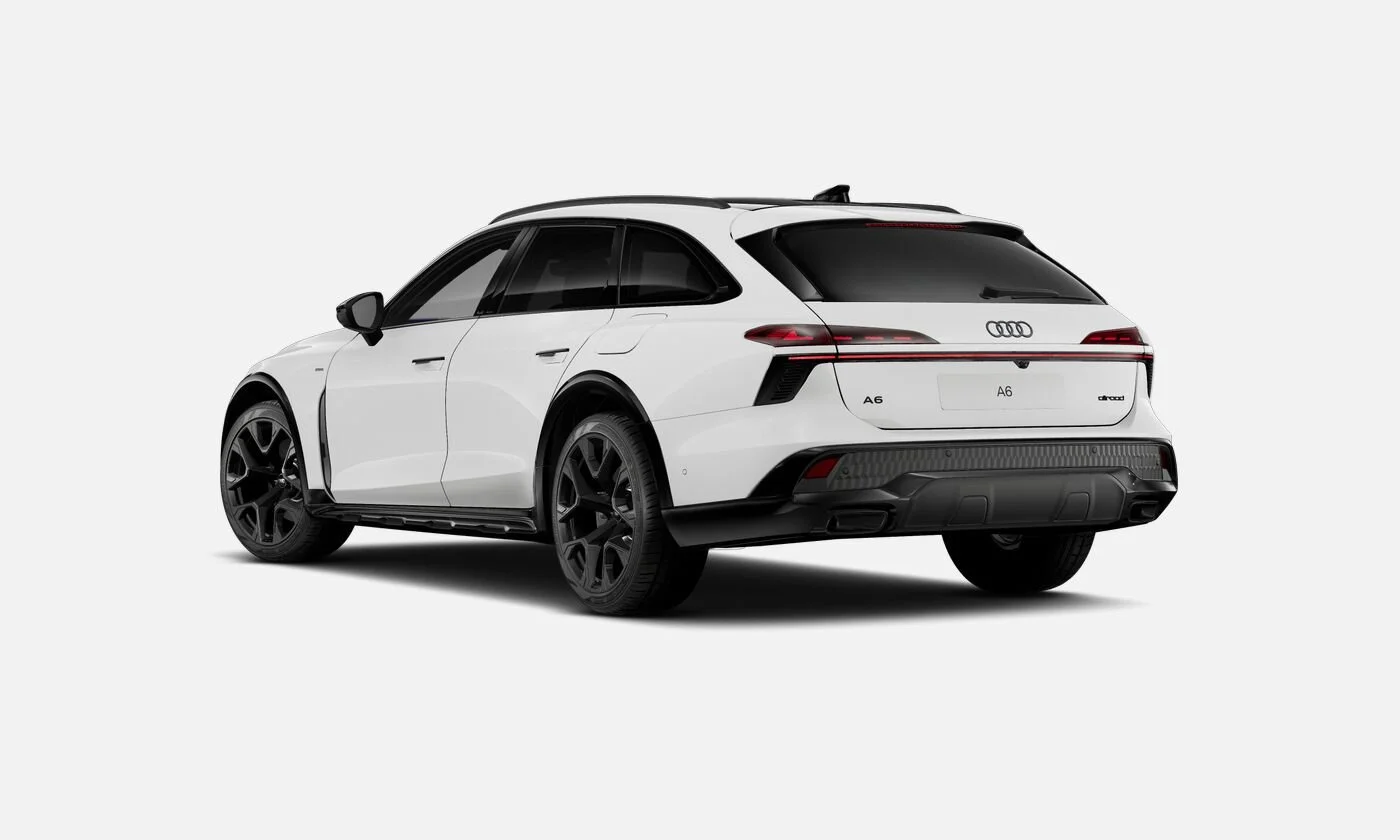 A white Audi A6 station wagon with black wheels, tinted windows, and black accents on a plain white background.