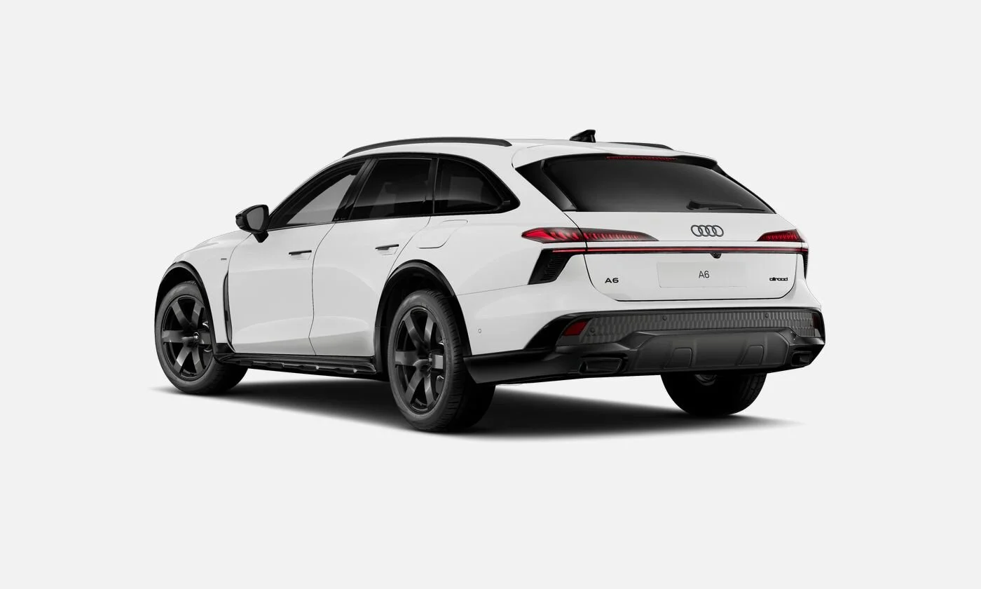 White Audi A6 allroad station wagon viewed from the rear, with black accents and dark tinted windows, on a plain white background.