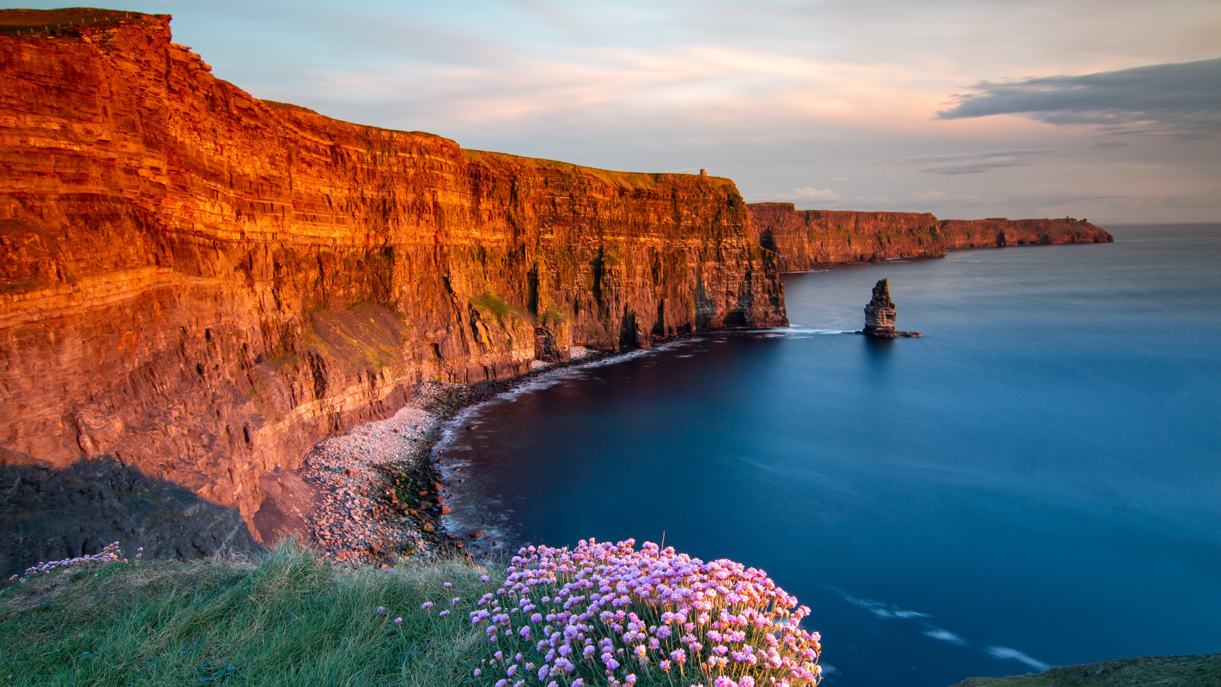 https://images.squarespace-cdn.com/content/v1/638684a5c6b0c5448ae3279b/1674697752923-AYCMQECBSHN5B76JI0UB/Cliffs%2Bof%2BMoher%2BSunset%2B.jpg?format=2500w