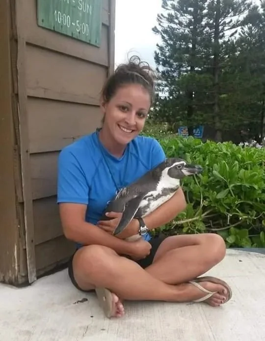 Cori Tufano, pictured with a penguin she used to work with