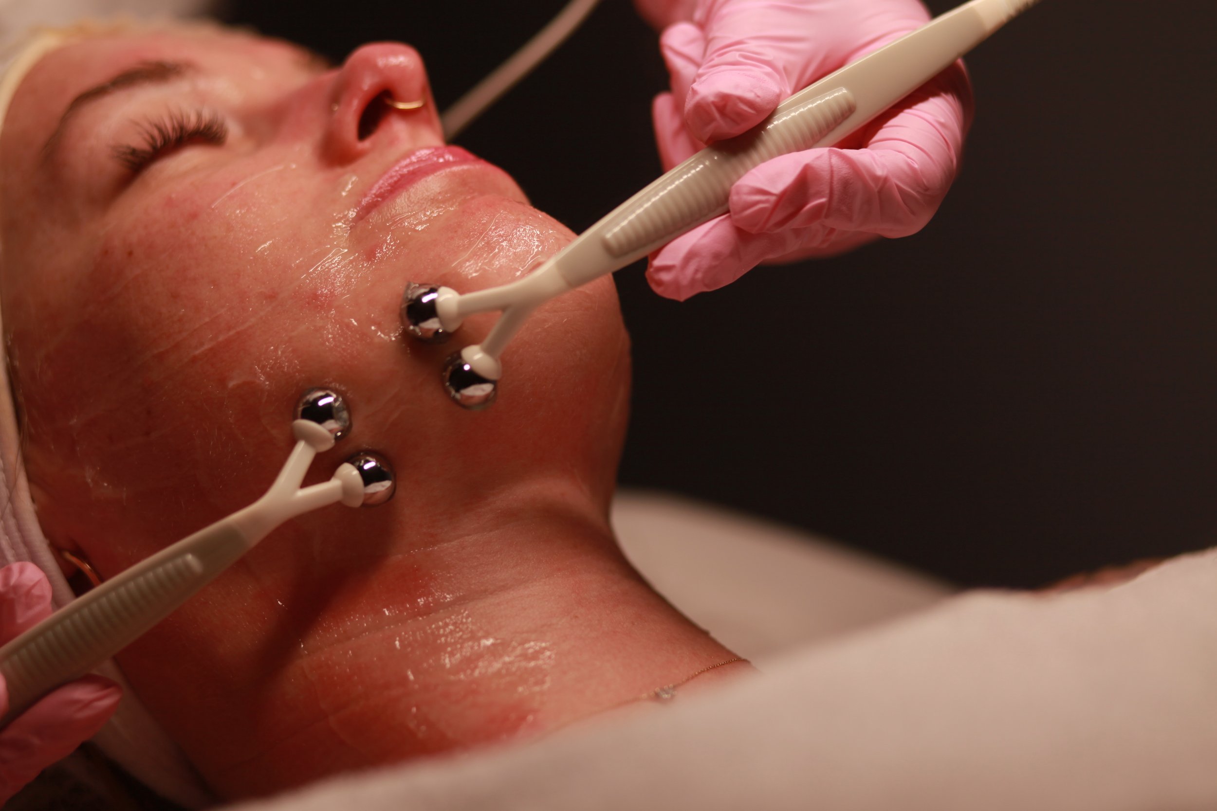 Microcurrent facial treatment for gentle facial muscle stimulation and lifting at Verni Beauty in Seattle.