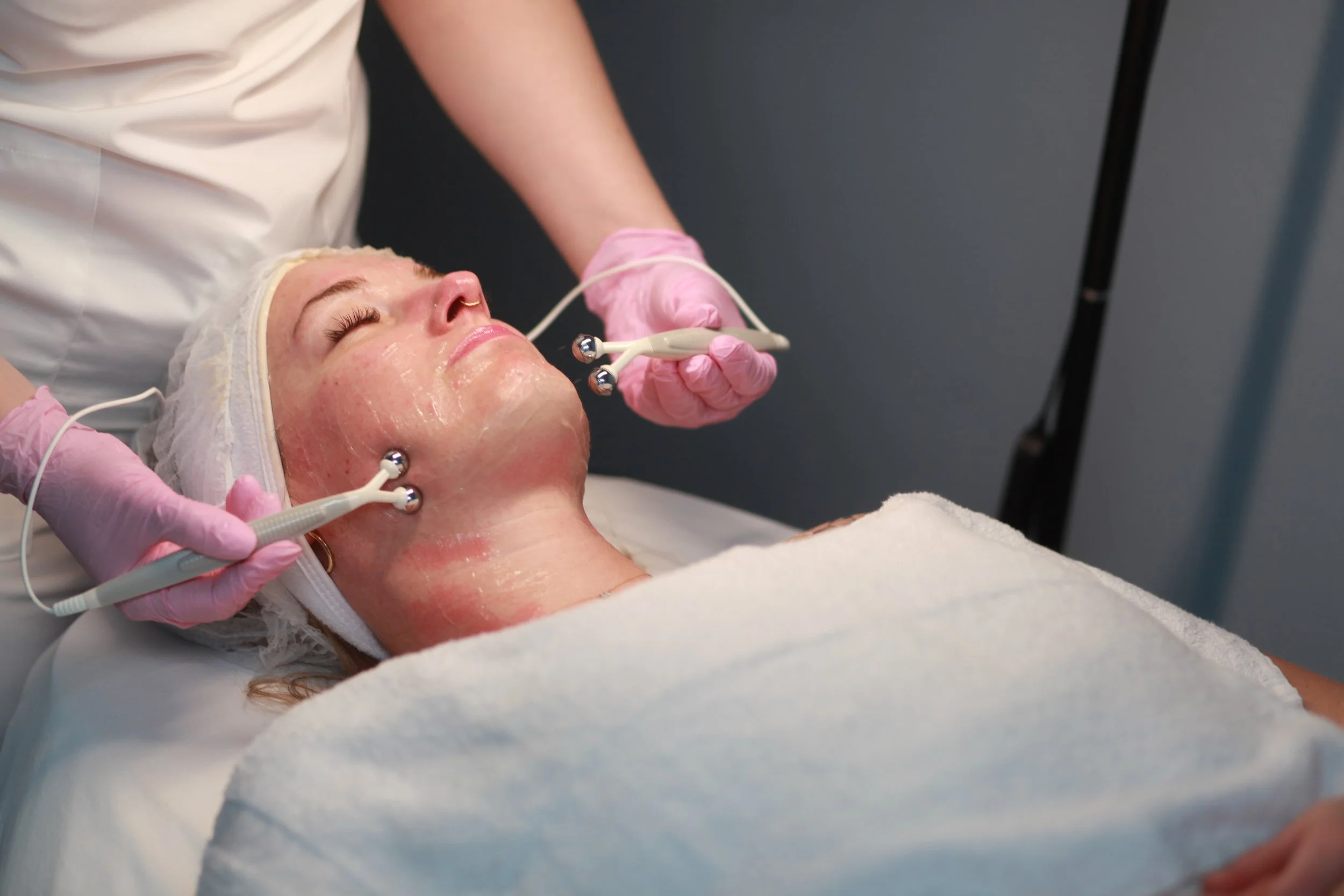 Microcurrent facial treatment for gentle facial muscle stimulation and lifting at Verni Beauty in Seattle.