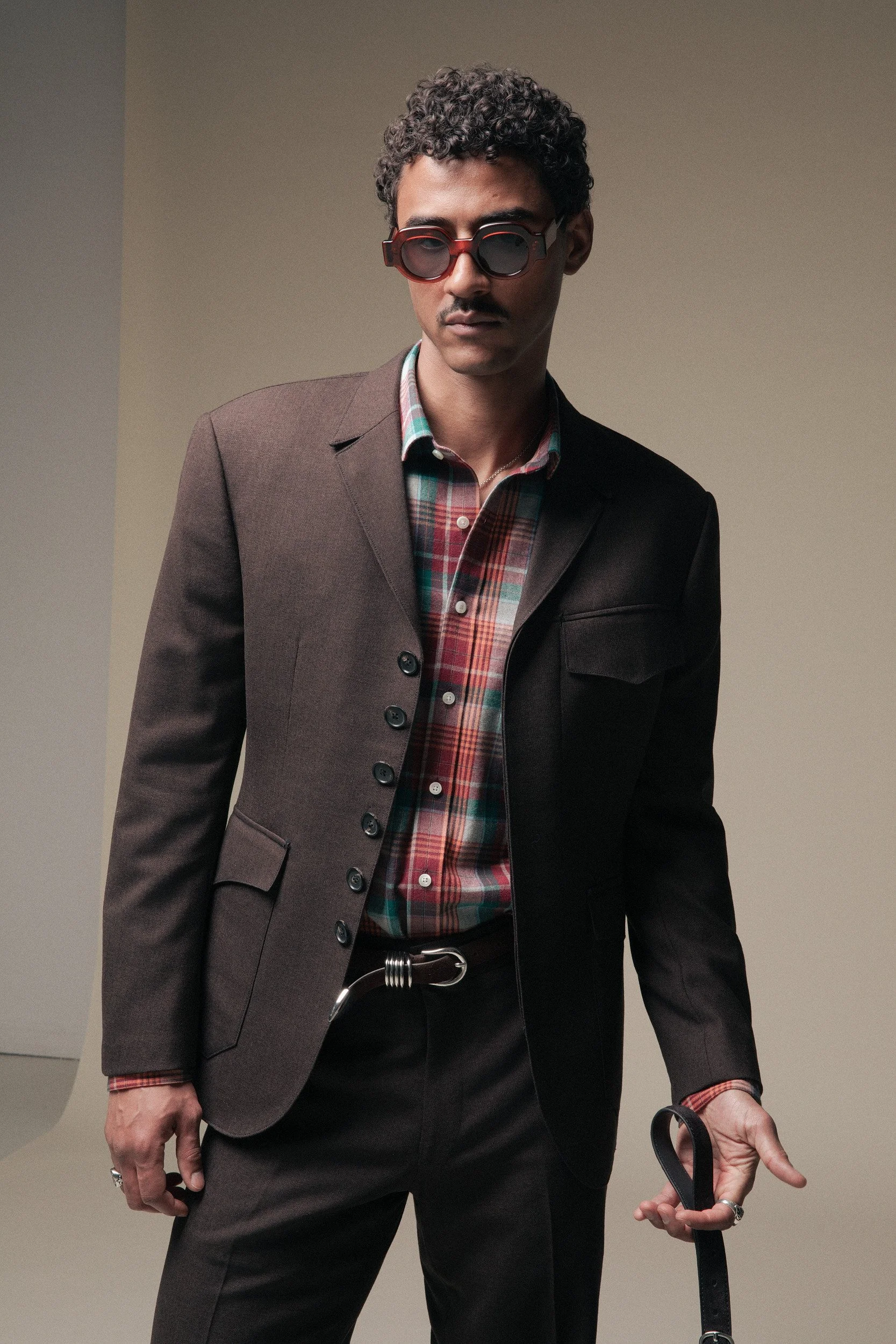 men's 6 button suit with western pocket details in a chocolate brown tropical wool featuring a fitted jacket and wide leg slightly flared trousers