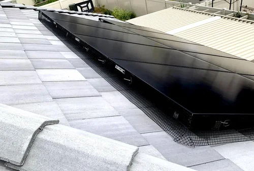 Bird proofing mesh installed around solar panels