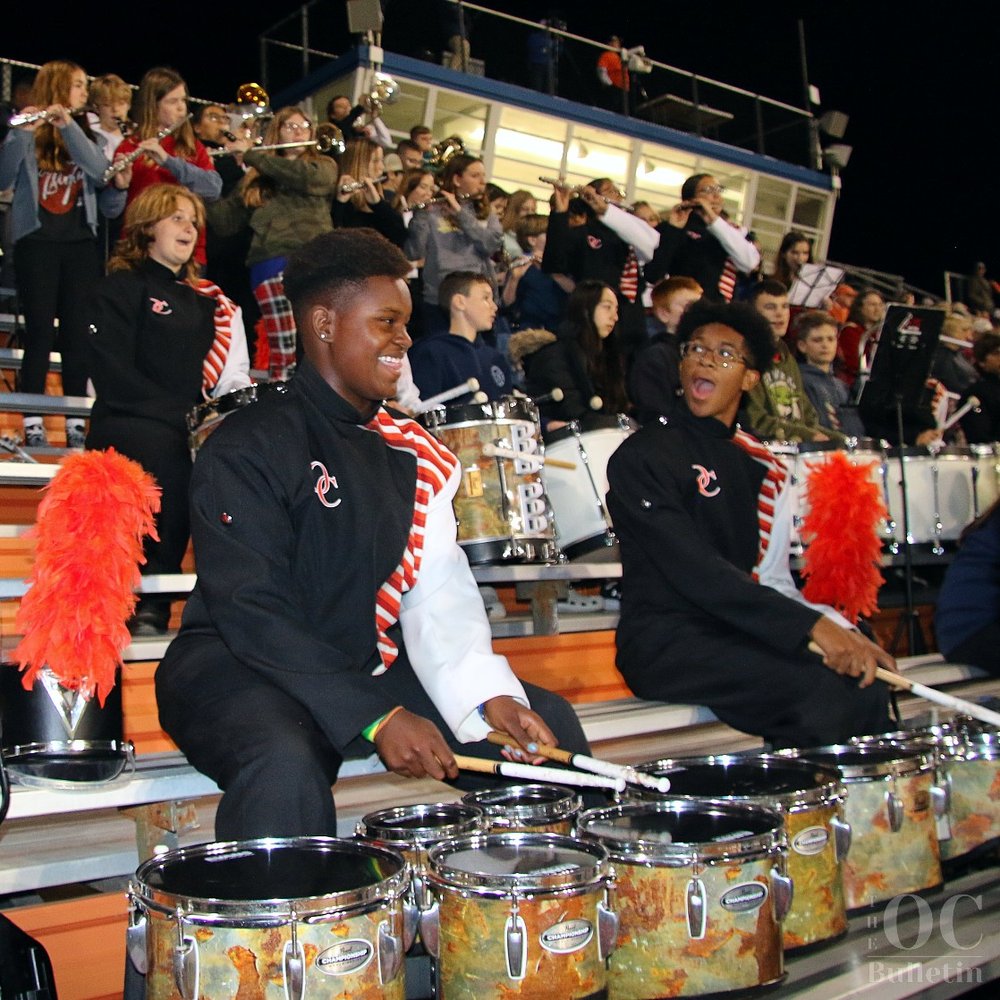  On Oct. 13, the Orange County High School marching band continued its annual tradition of welcoming Orange County middle schoolers into the stands for a joint performance. (Photo Credit: Andra Landi) 