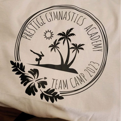 Design with palm trees, a small sun, an acrobatic gymnast, and tropical leaves, with text reading "Prestige Gymnastics Academy Team Camp 2023" in a circular layout.
