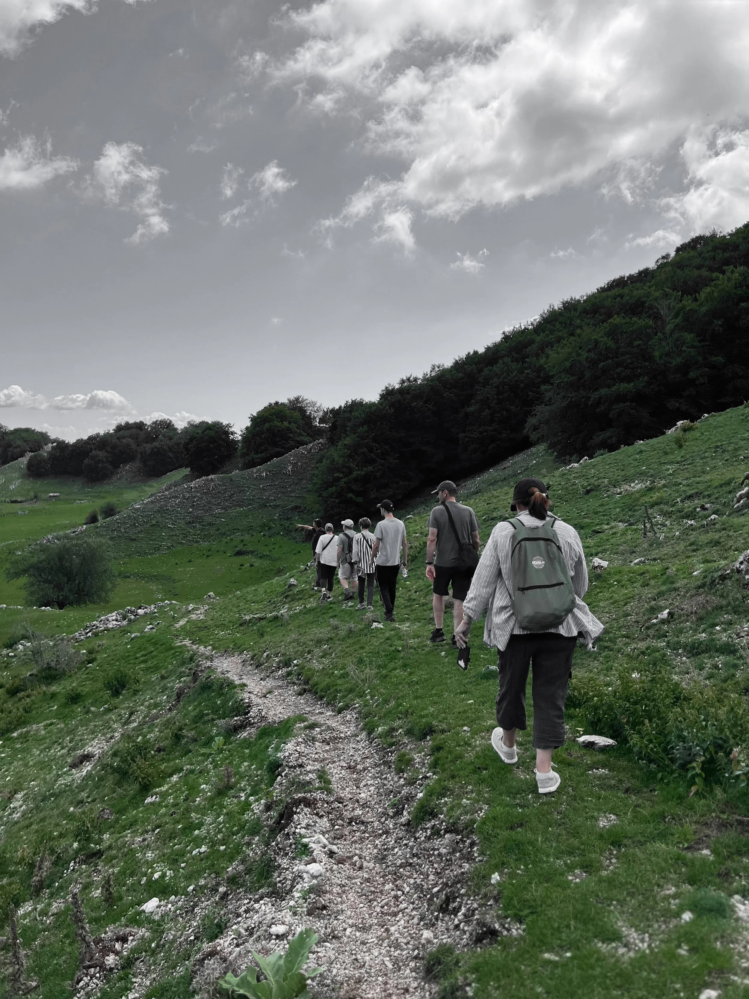 Antica Travel Co guests walking along an ancient shepherd path in the Apennines of Ciociaria, the Wild Heart of Italy