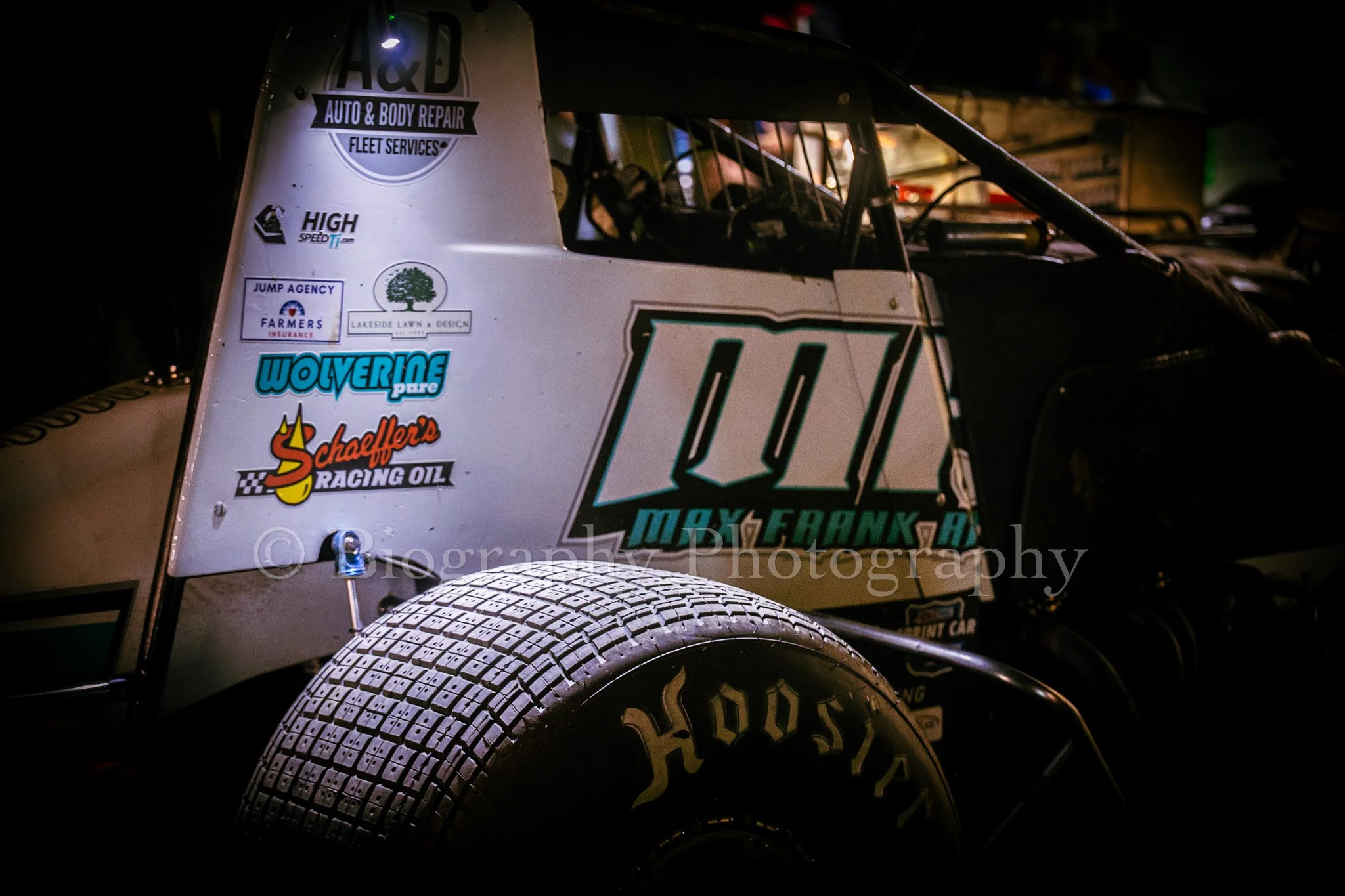 Sprint car in the pits at night at Silver Bullet Speedway