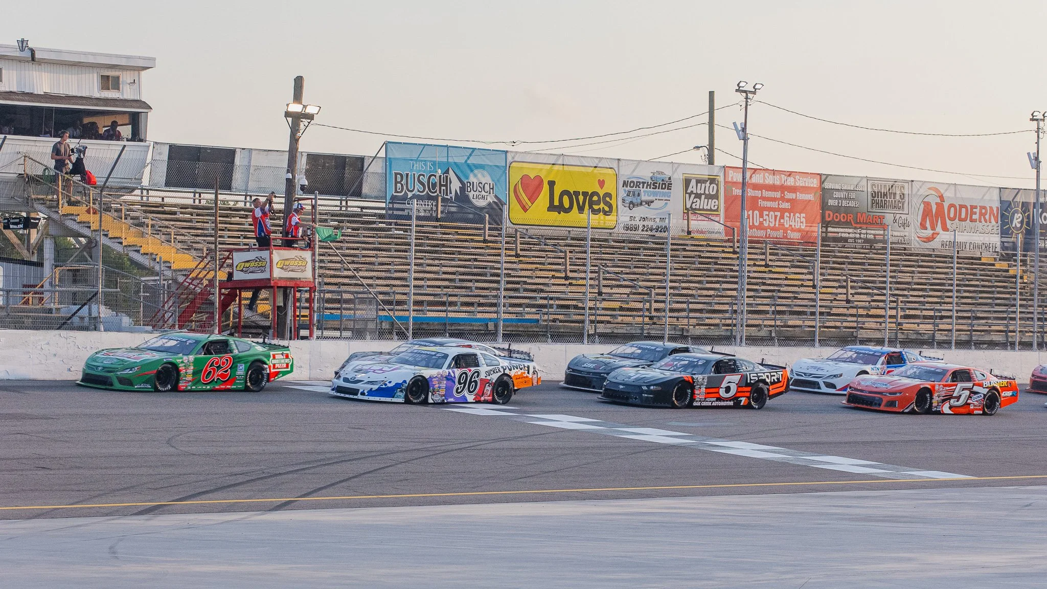 Asphalt late model racers taking the green flag for the 2026 Michigan 300 at Owosso Speedway