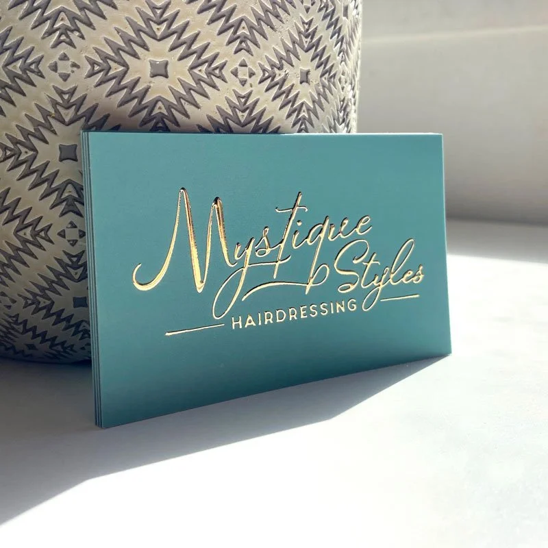 Gold foil hairdressing business card for Mystique Styles Hairdressing