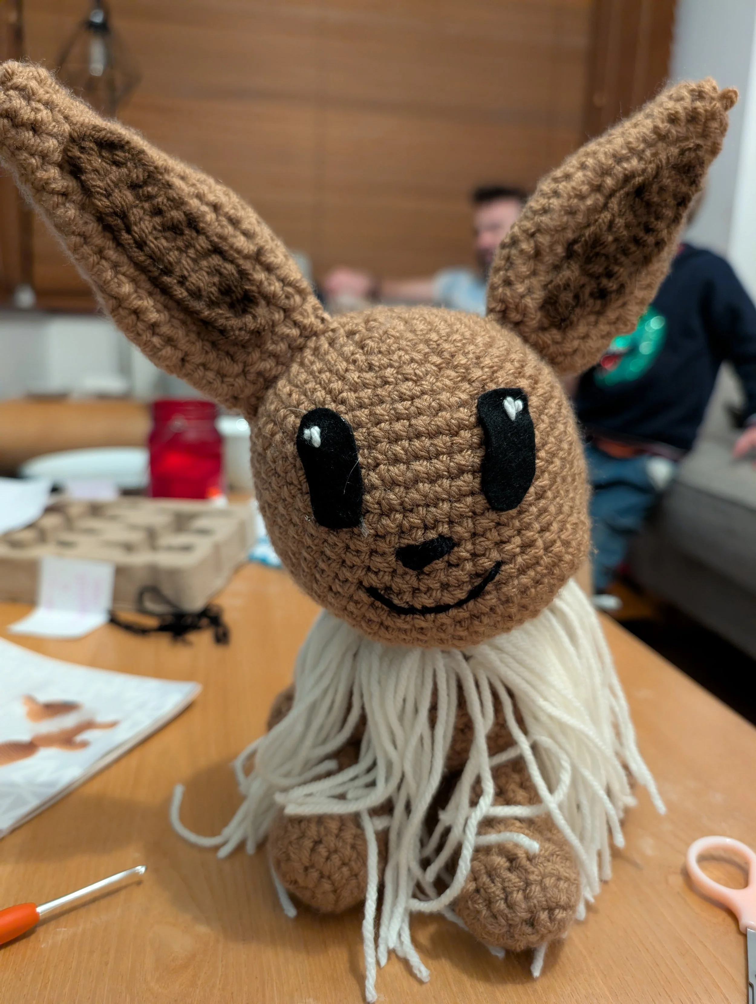 Ruff added, pre-fluffing the yarn.
