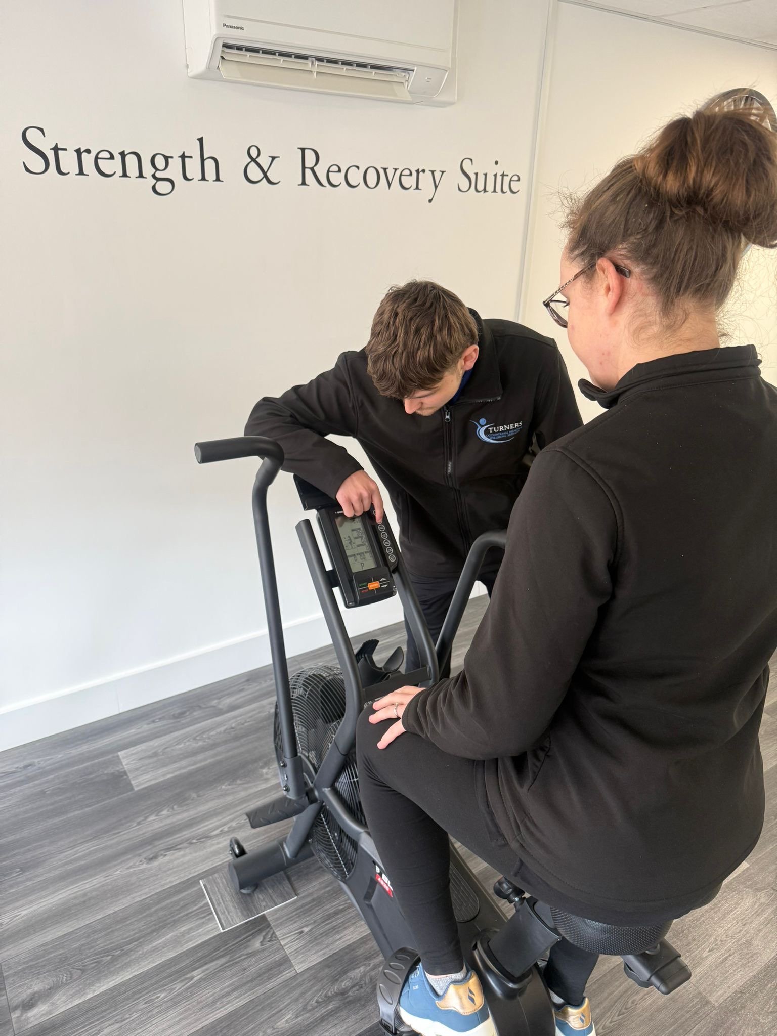 Woman training on an exercise bike