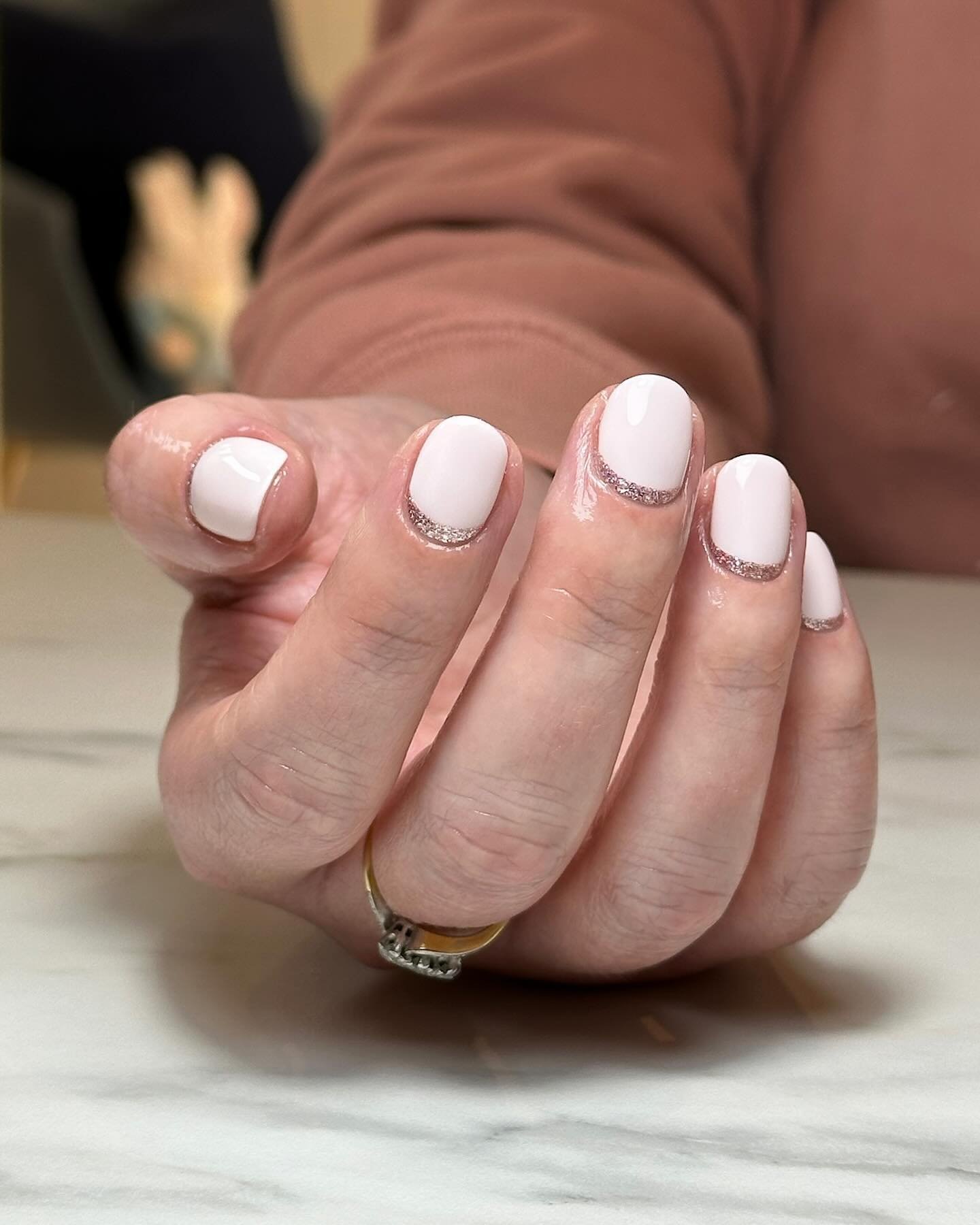 c l a s s y  c u t i c l e  c u f f s

Indoor &amp; outdoor pics as the sun paid us a brief visit&hellip;

My client usually goes for detailed nail art but she fancied something simple and understated after seeing all the milky mani nail inspo with s