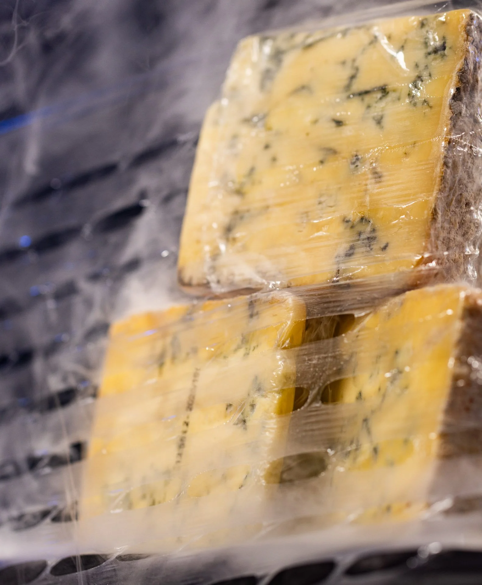 Blue cheese wrapped in ExcelAir perforated pallet wrap maintaining chilled storage conditions