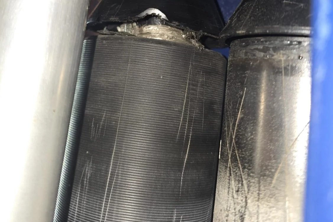 Damaged pre-stretch rollers on pallet wrapping machine affecting film performance