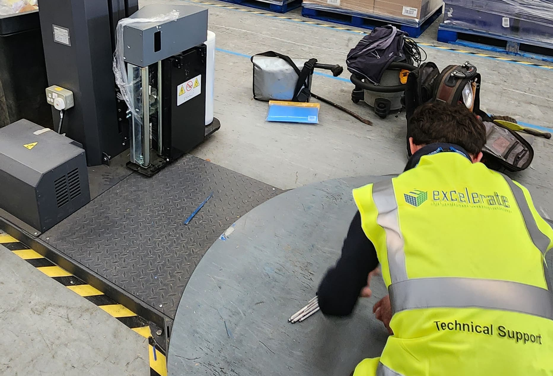 Excelerate engineer working on a IBIS pallet wrapper