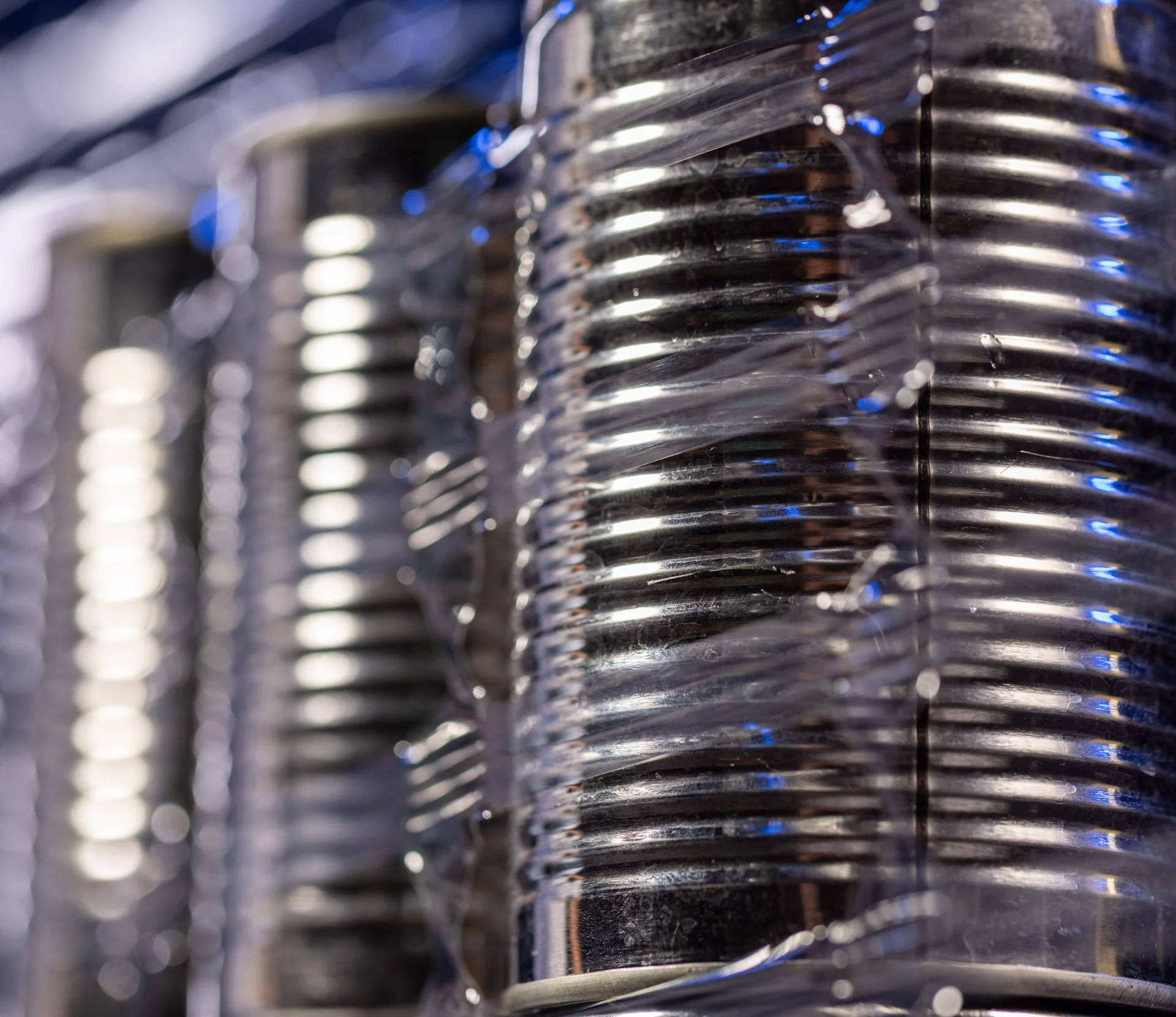 Aluminium cans wrapped in ExcelAir breathable pallet wrap reducing condensation in production and export