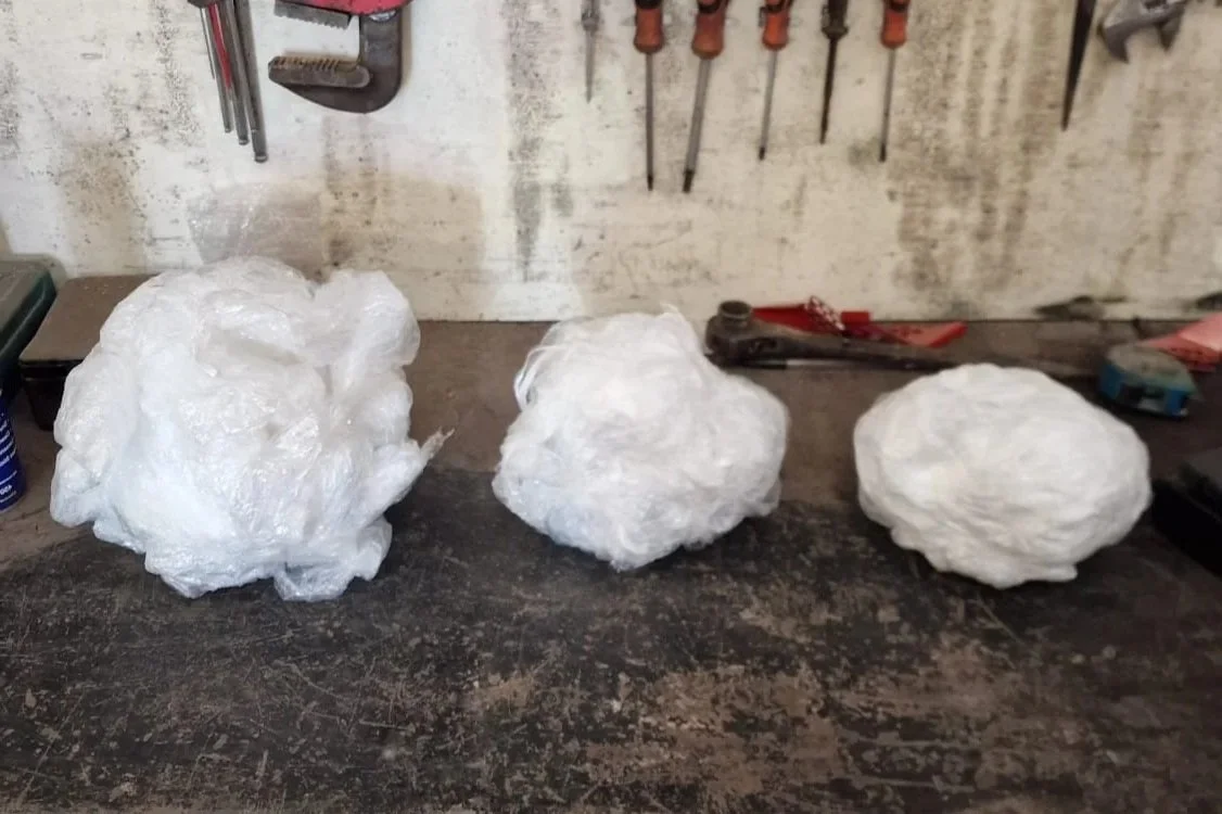 Pallet wrapping machine film usage comparison showing reduced film after servicing