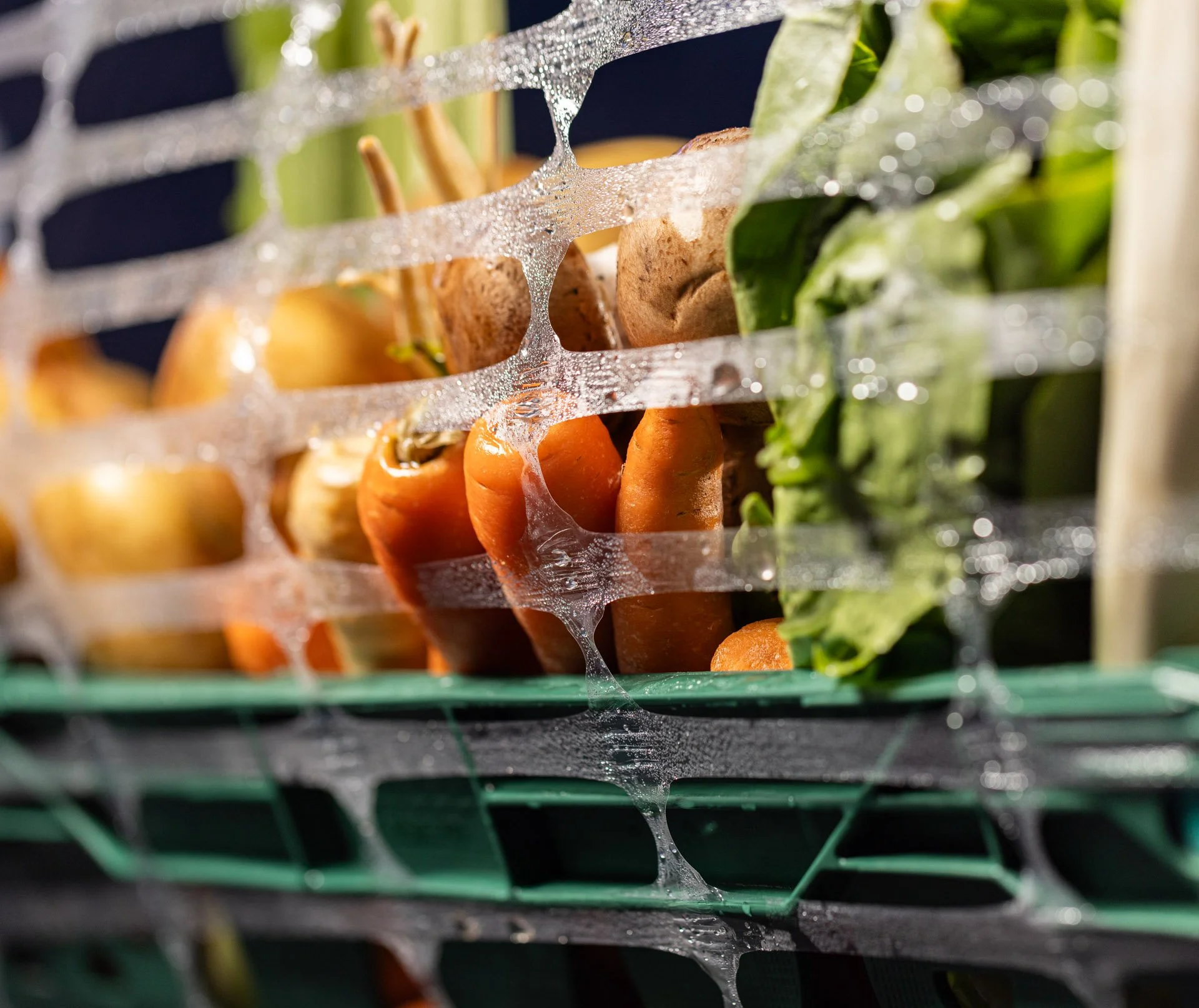 Fresh produce wrapped in ExcelAir perforated pallet wrap to extend shelf life and reduce mould