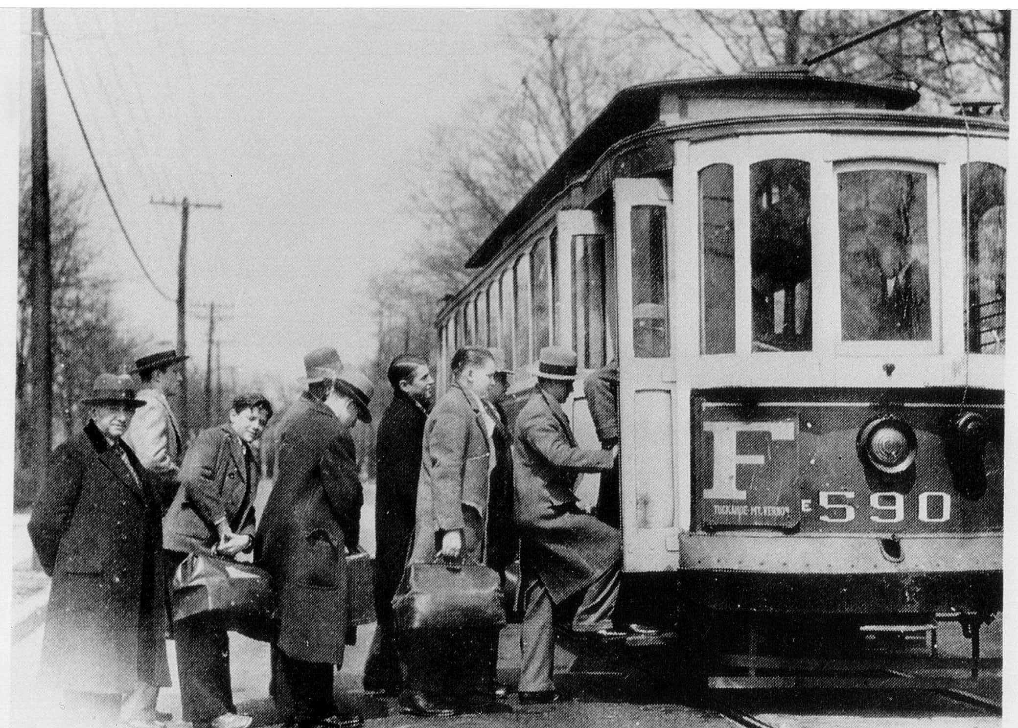 Pic-661 (People Getting on Trolly Car)