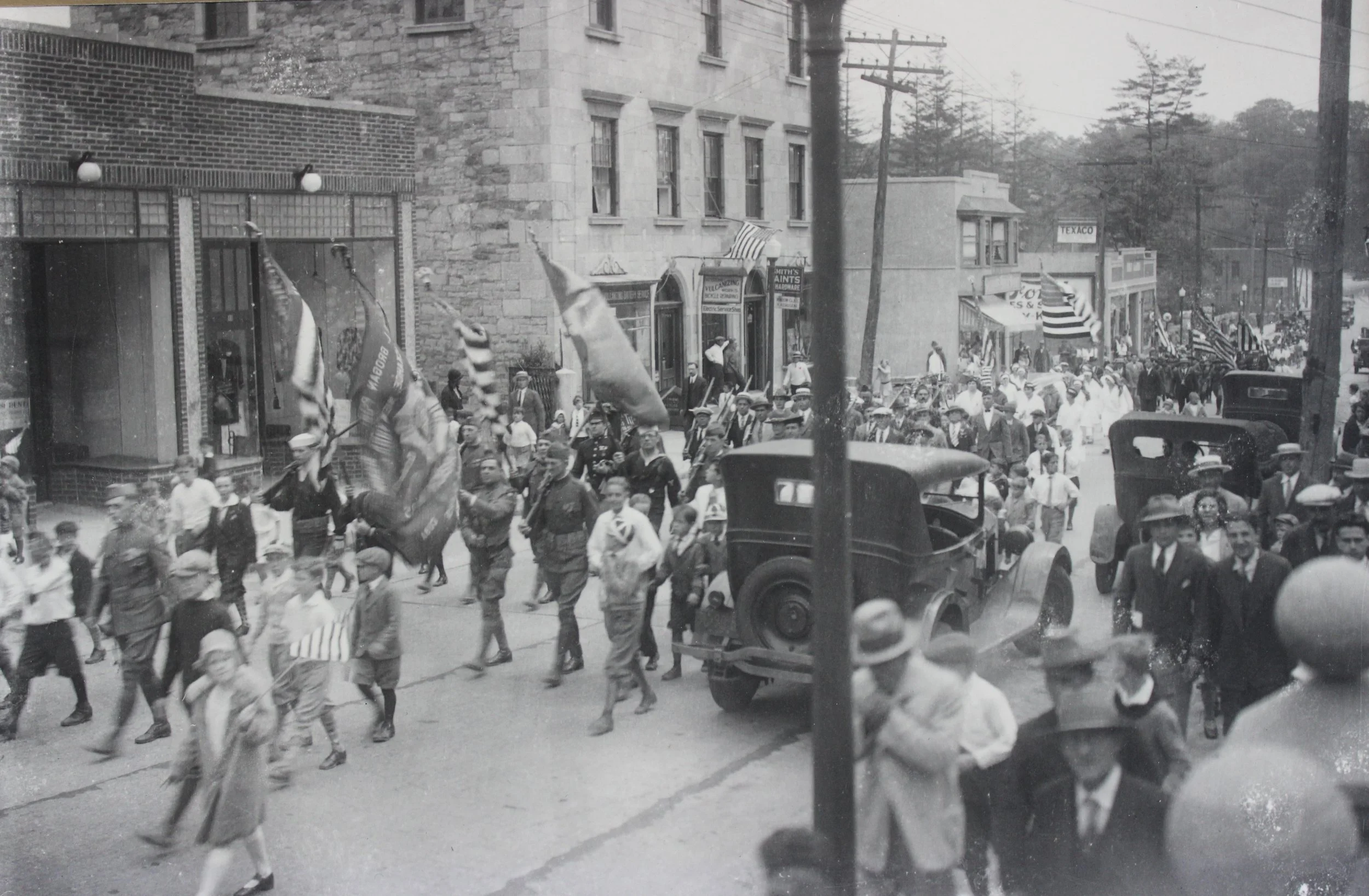 Pic-137 (Before WWII, Military Parade on Main Street -1940 Washington Hotel is in center)