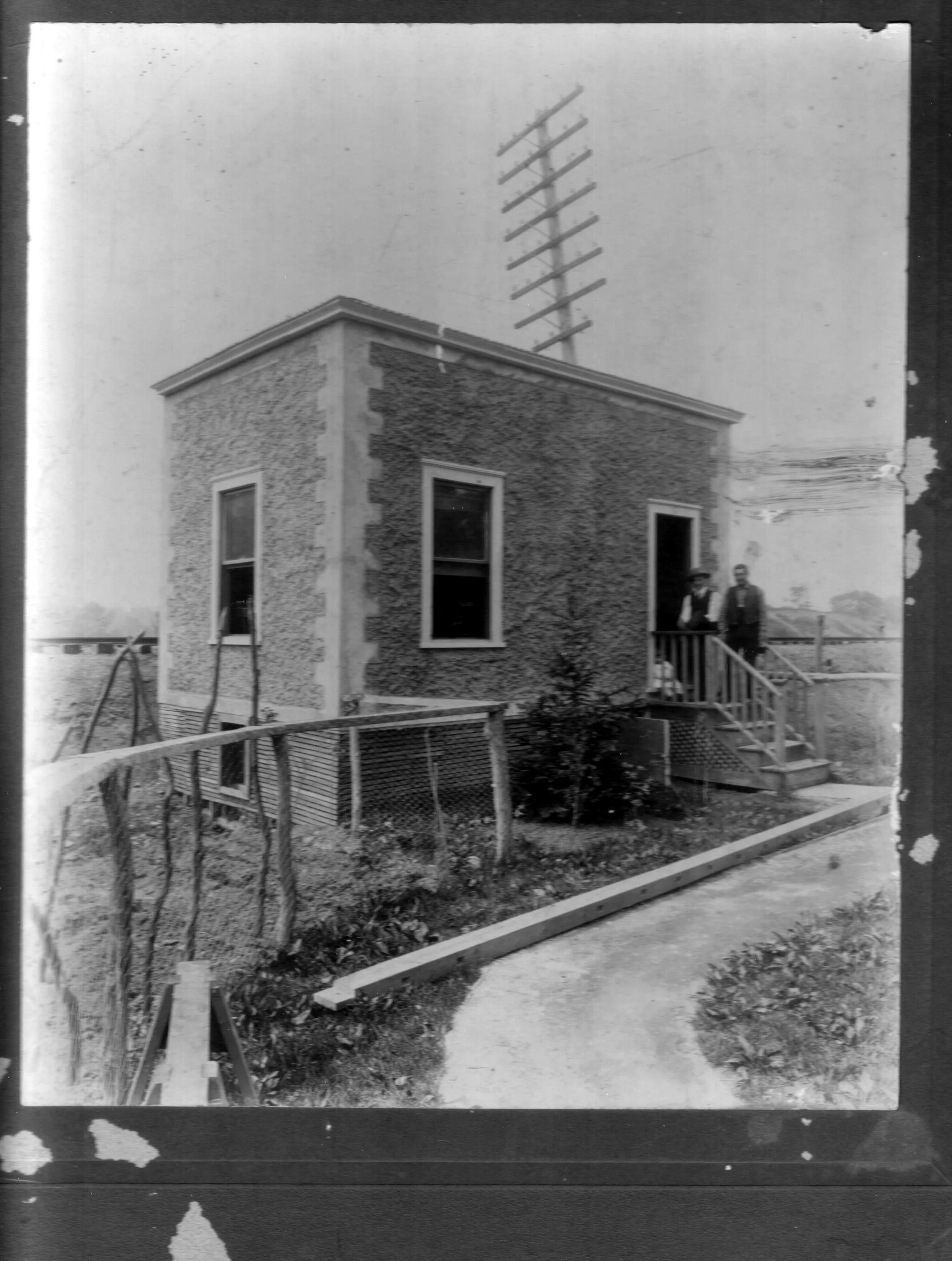 Pic-715 (2 Men and Building)