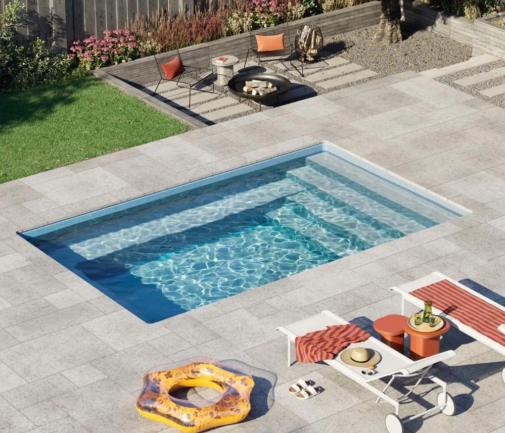 An inground plunge pool in a backyard