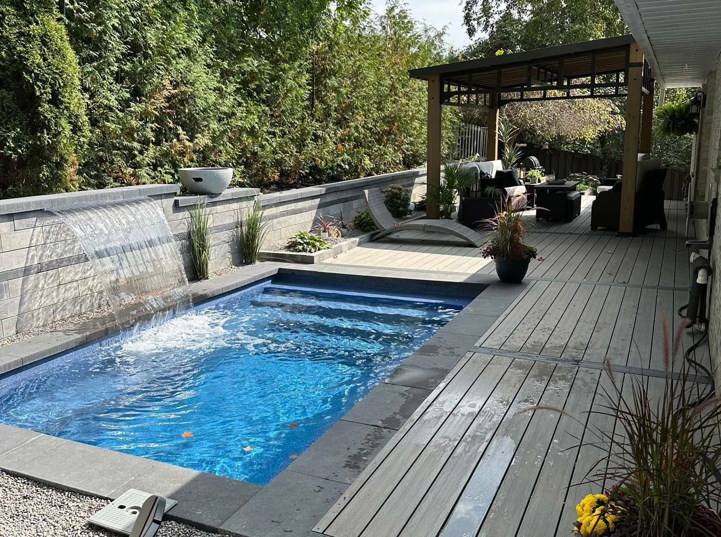 A plunge pool in a backyard deck