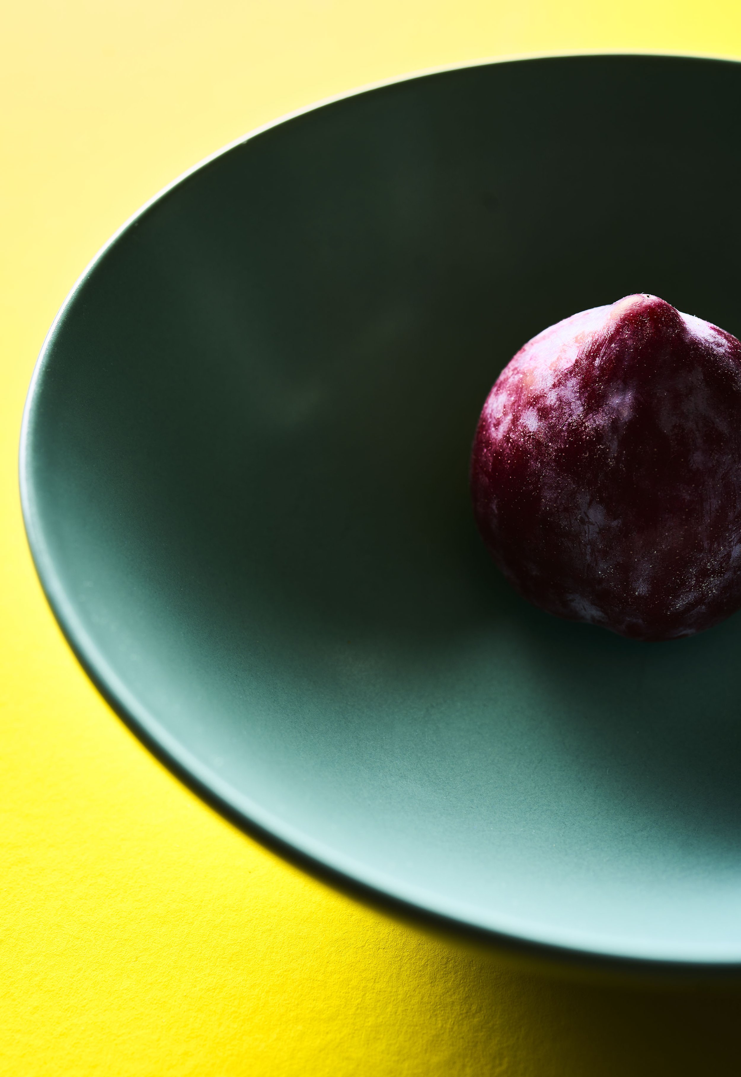Plum on Yellow by Lorenzo Tonti. Colourful photographic print A1