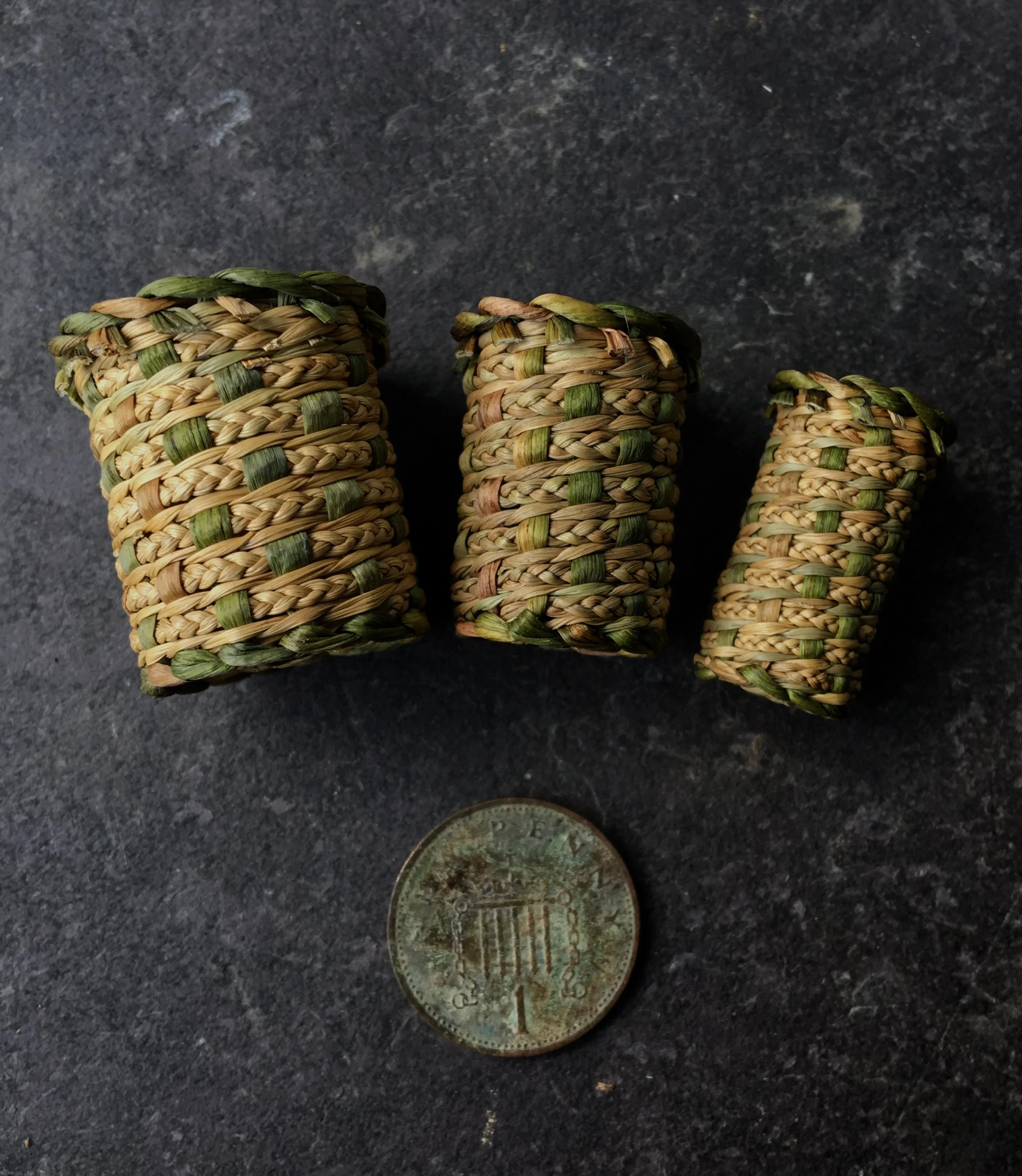ROSEY FAREY Miniature Baskets, left, Large plaited soft rush and english bulrush pot £80