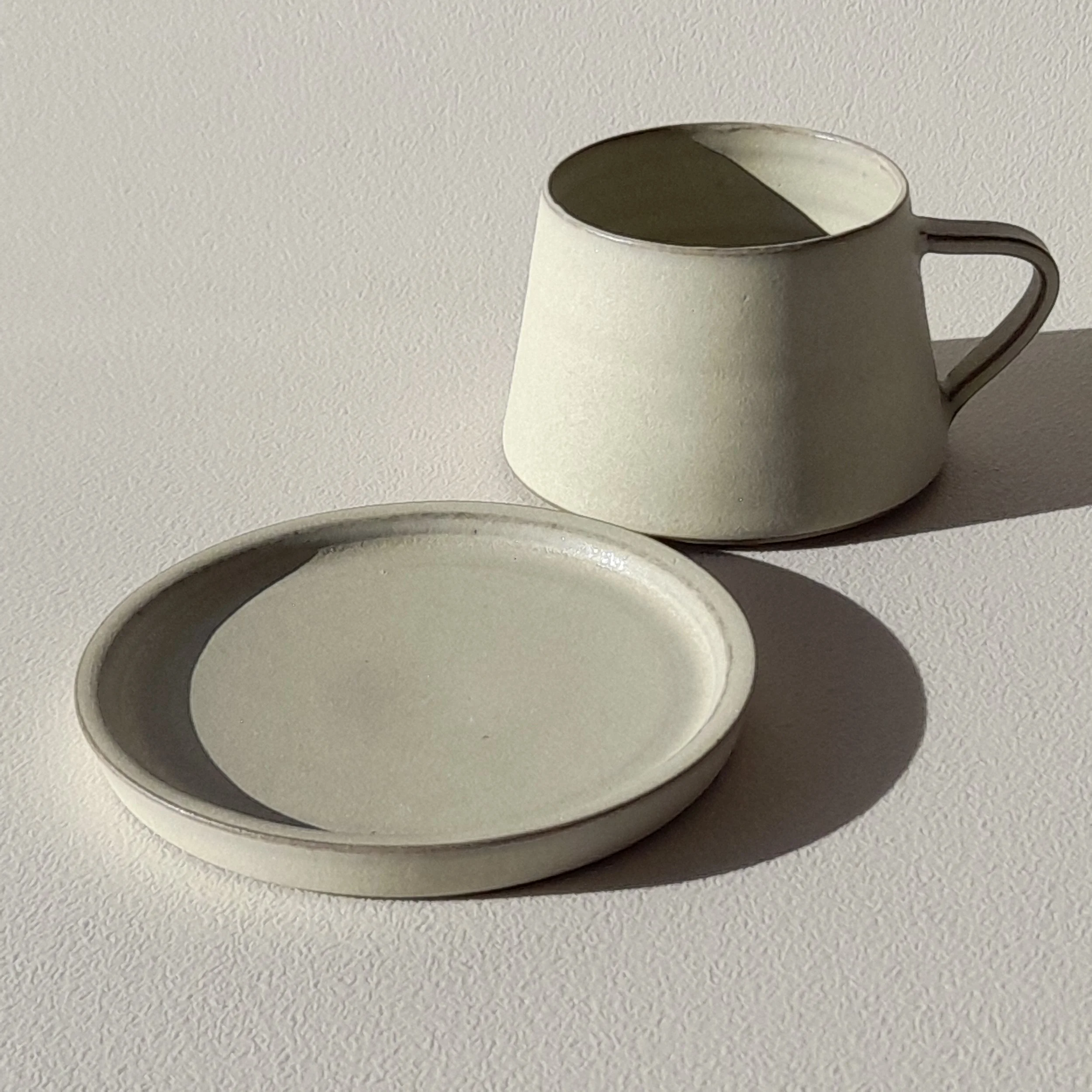 Tapered cup and saucer, cream