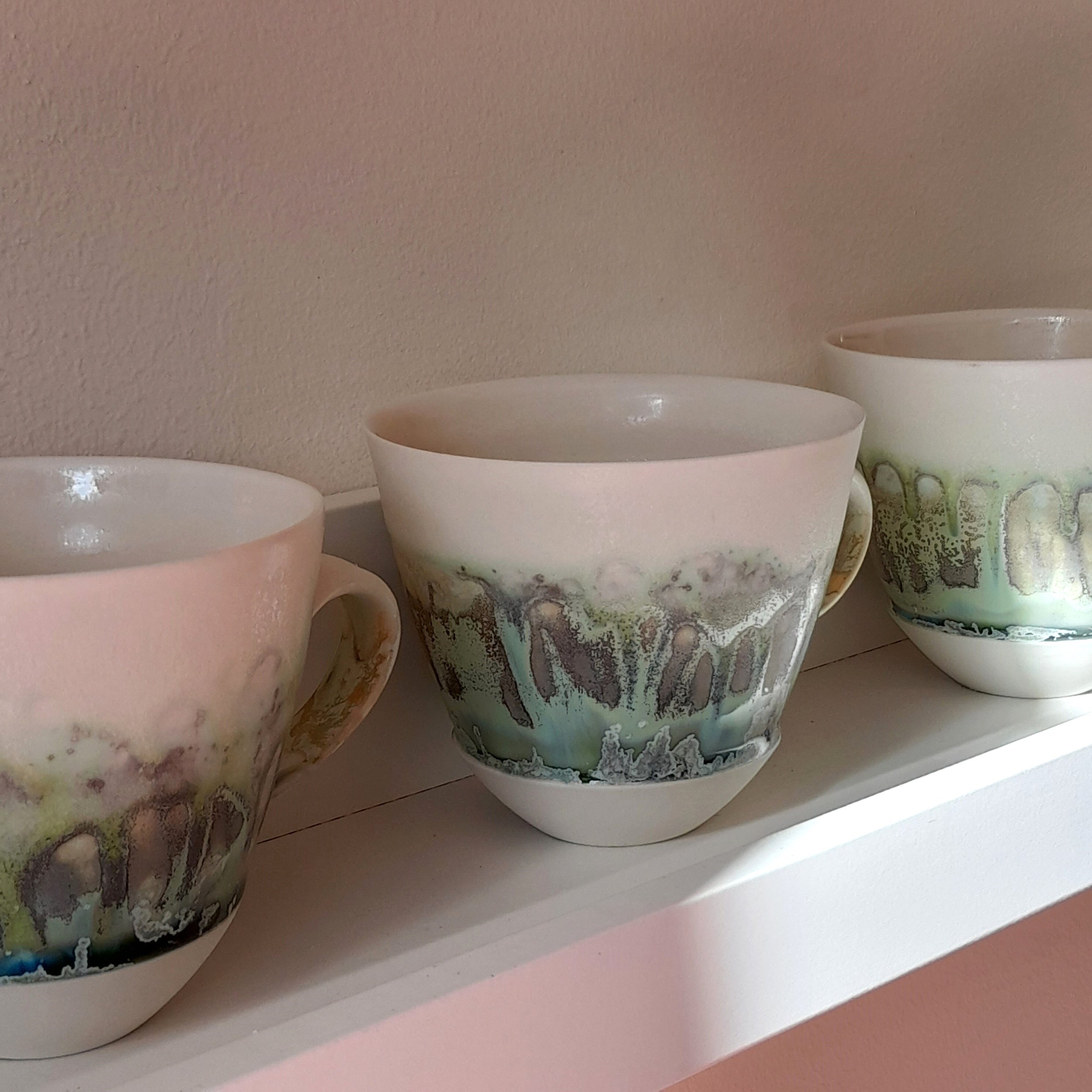 3 Iona Ceramics FLUX cups on a shelf