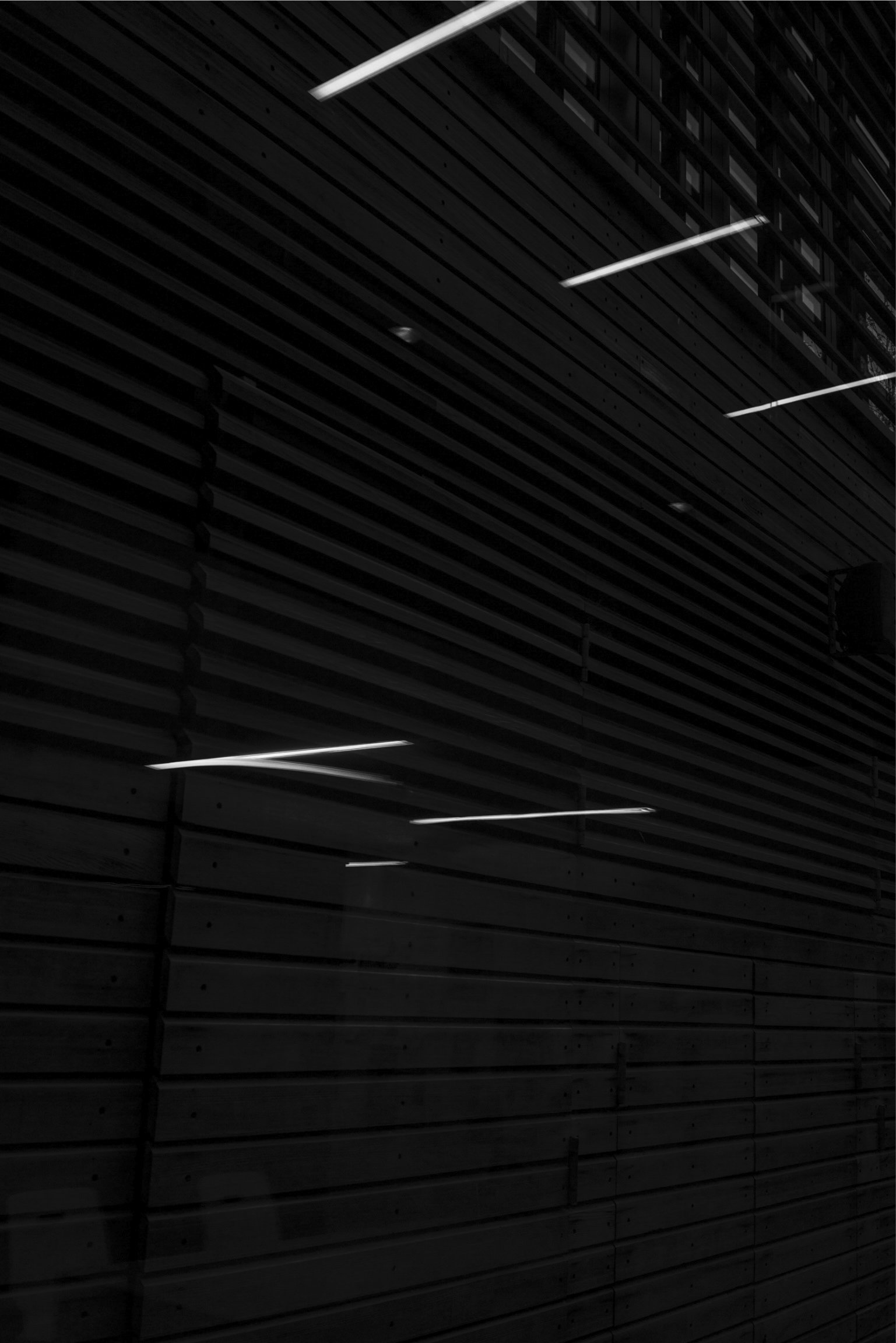 Image showing graphic strips of light from ceiling light bars