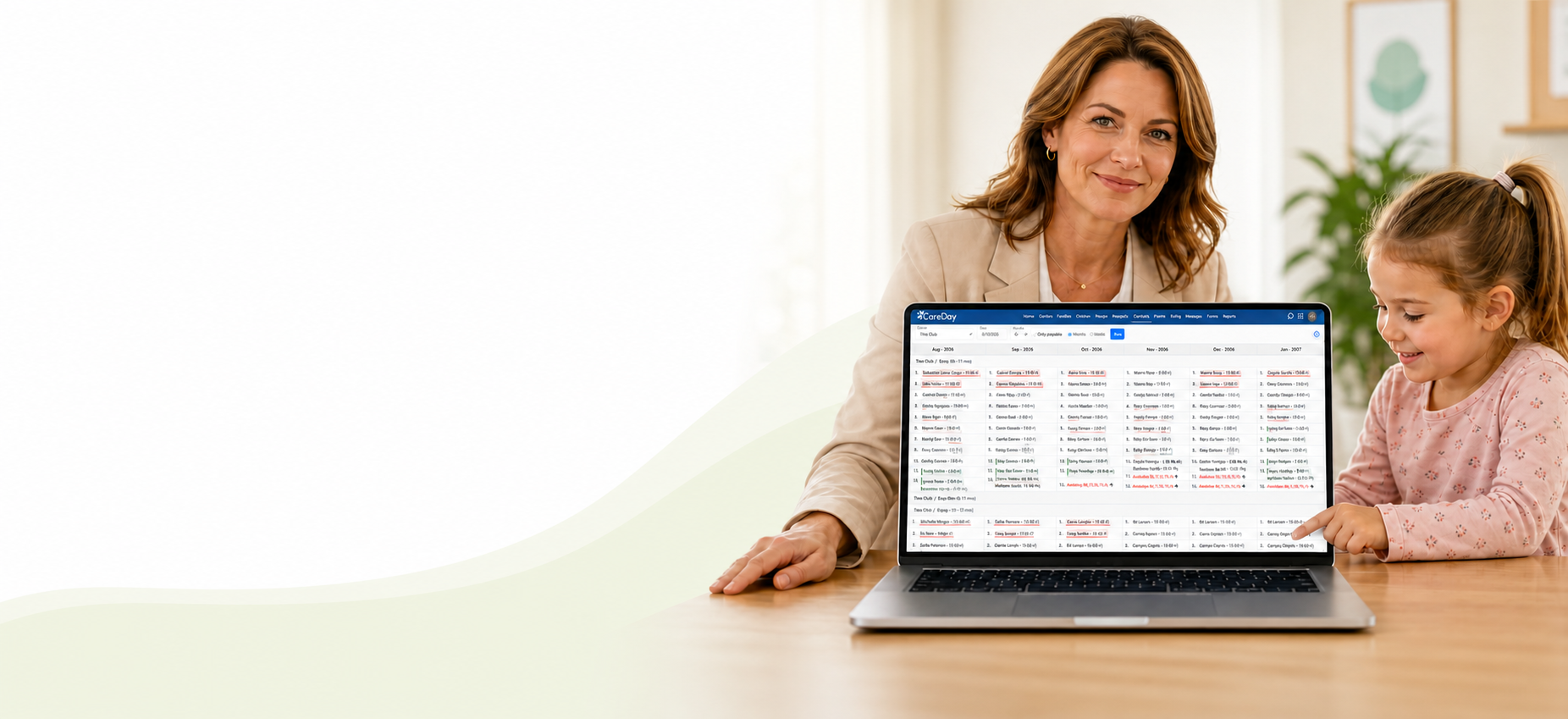 Childcare director reviewing CareDay’s future enrollment schedule with a child