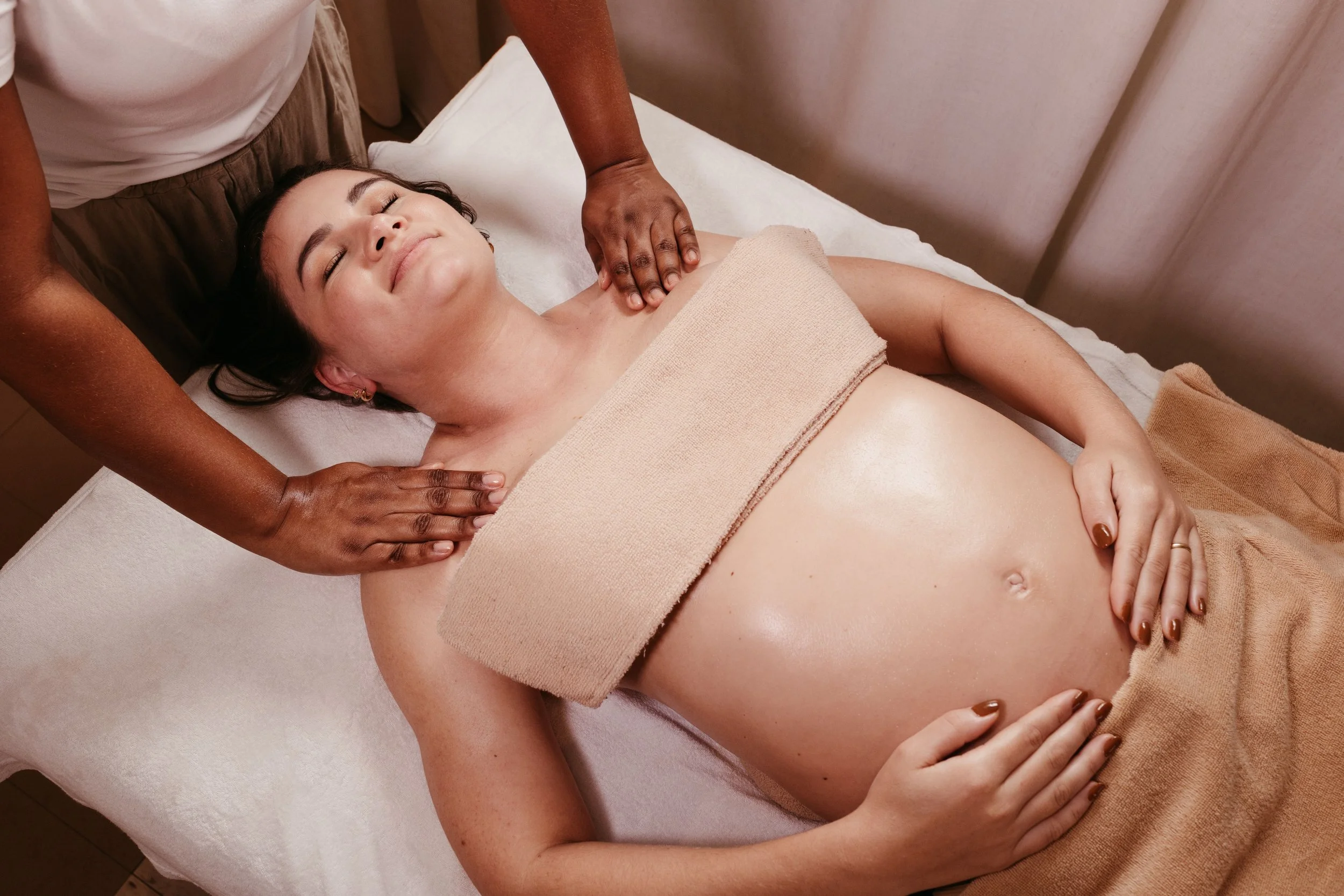 Pregnant woman receiving a massage